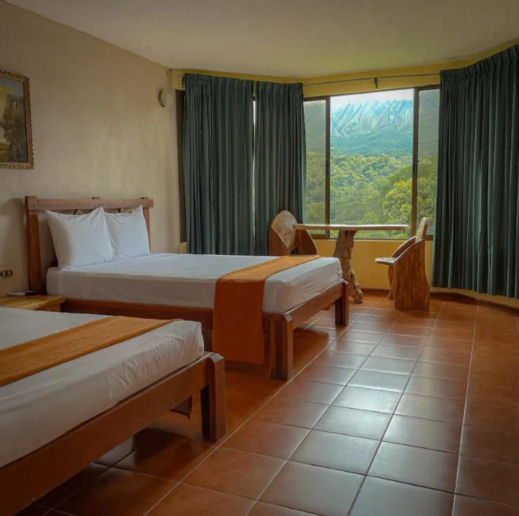 Bed in Arenal Roca Lodge & Bungalows
