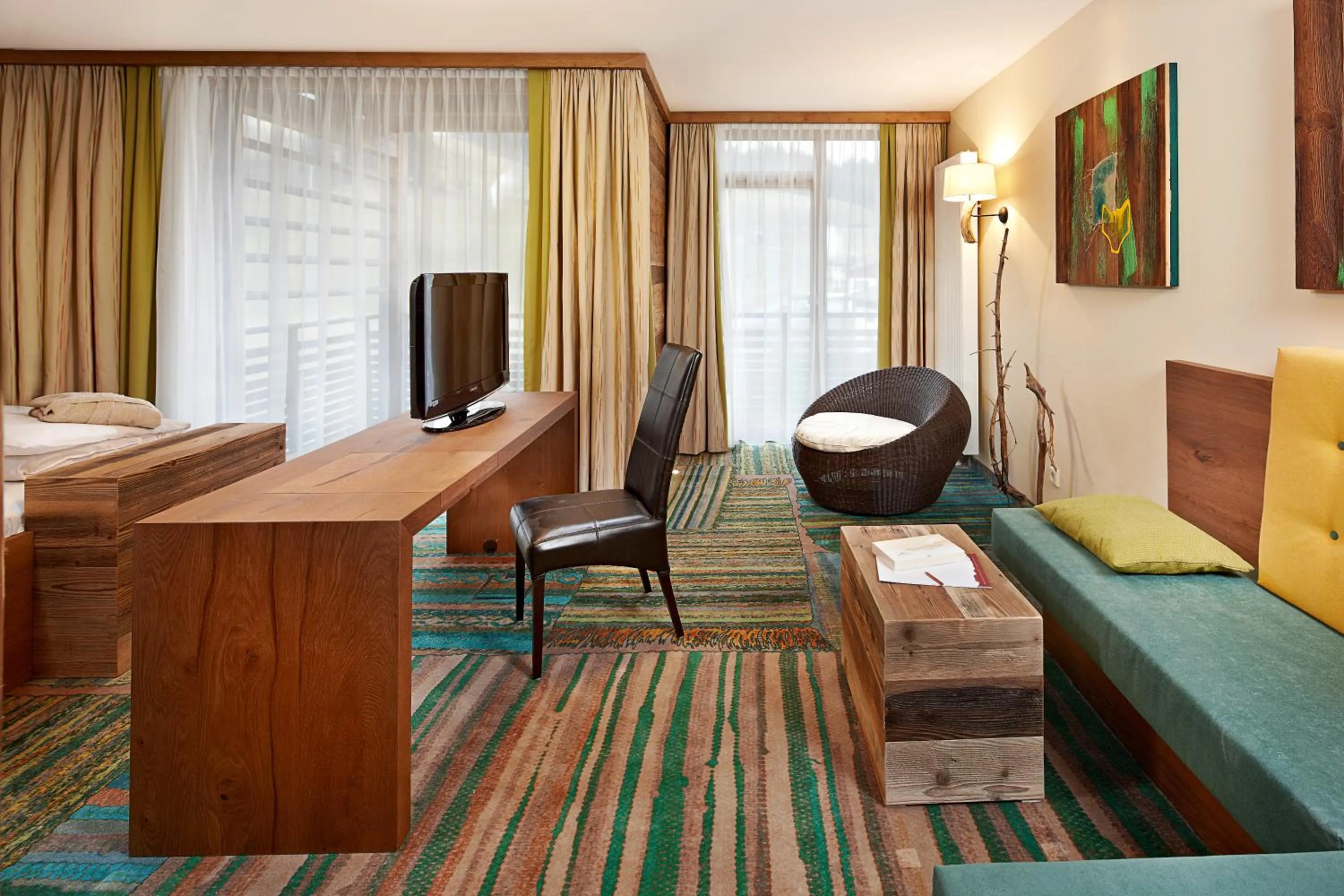 Photo of the whole room, Bed in Hotel Salzburger Hof Leogang