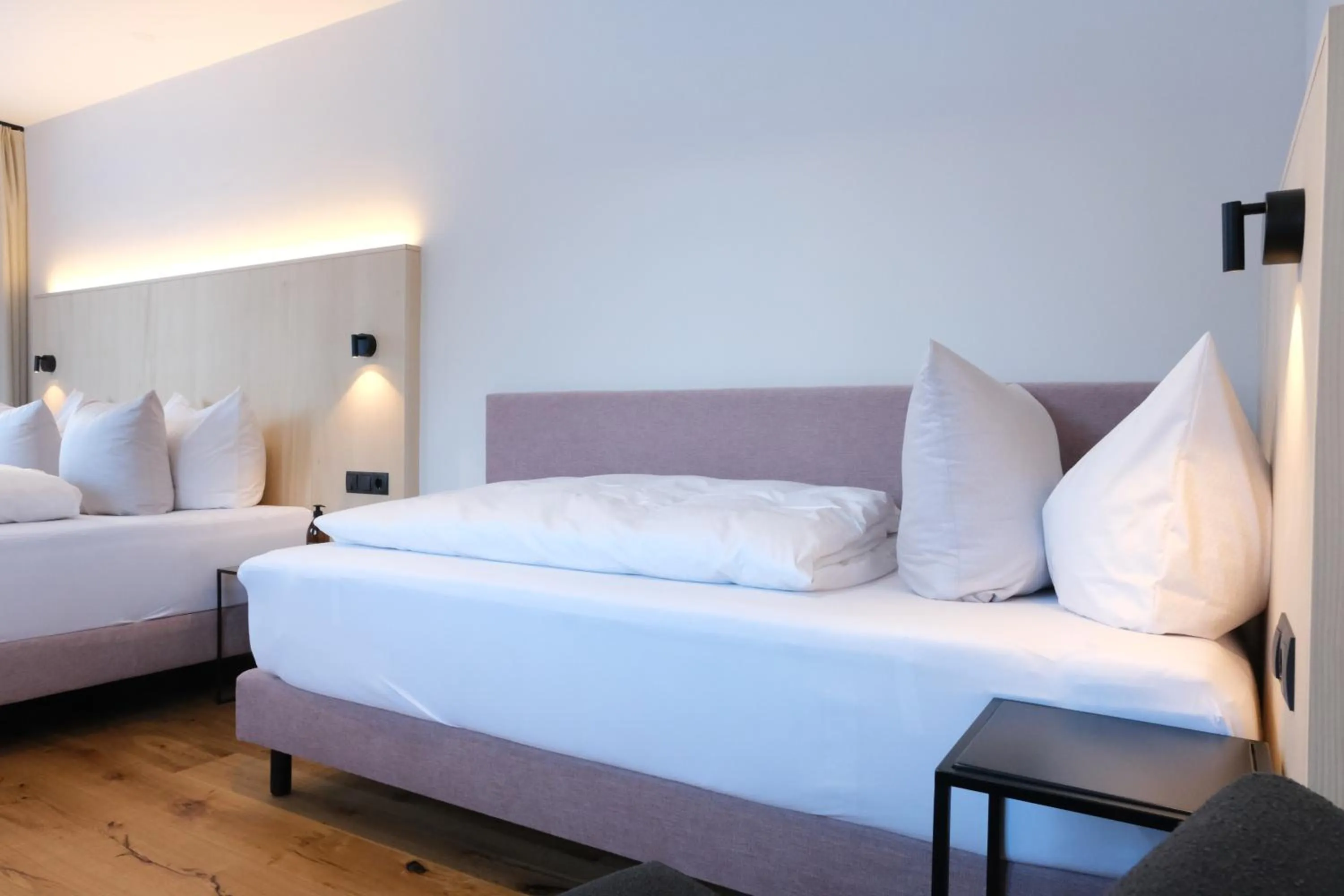 Bed in Hotel Die Arlbergerin - Design & Tiroler Gemütlichkeit