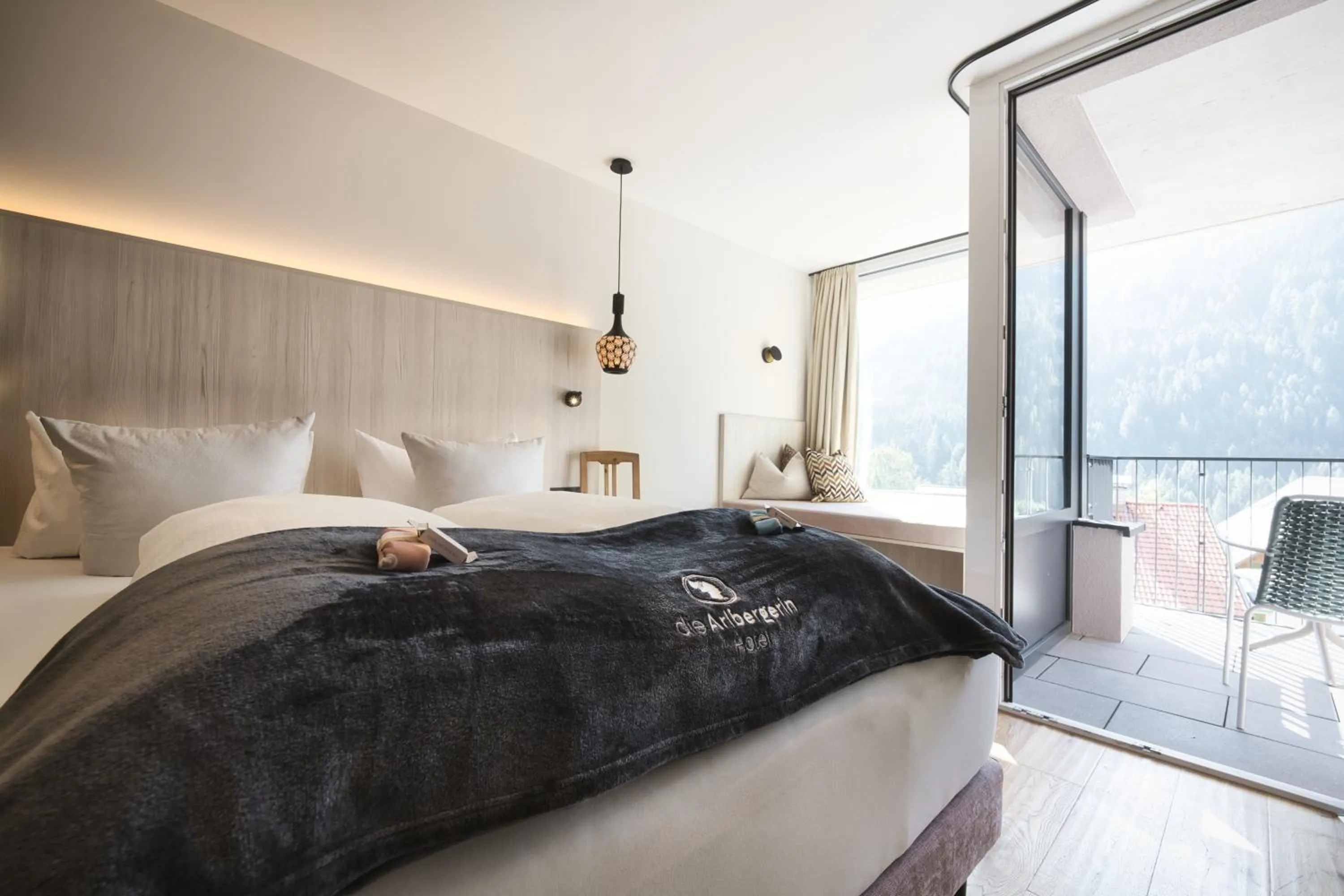 Bedroom, Bed in Hotel Die Arlbergerin - Design & Tiroler Gemütlichkeit