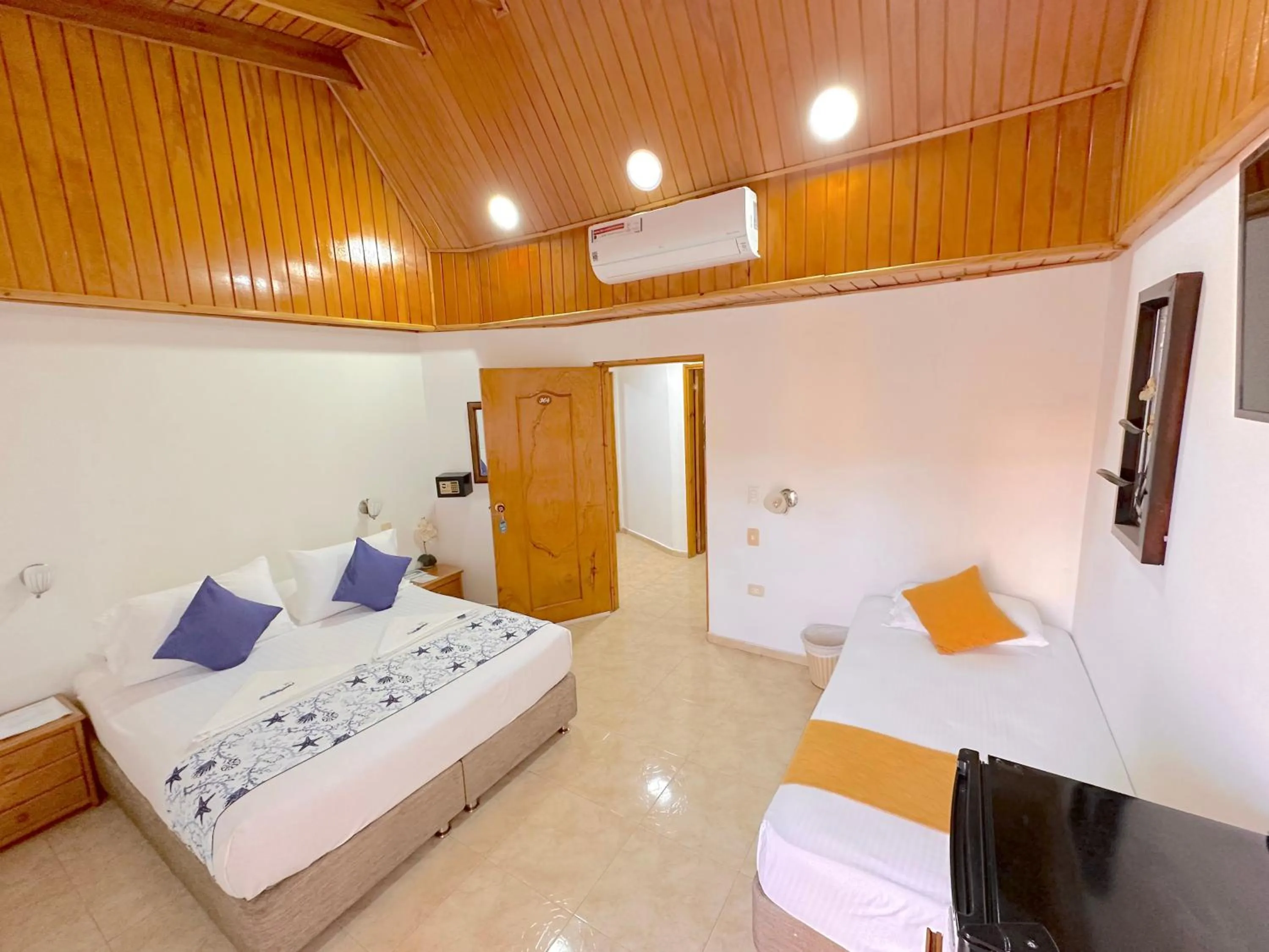 Bed in Hotel Grand Caribe