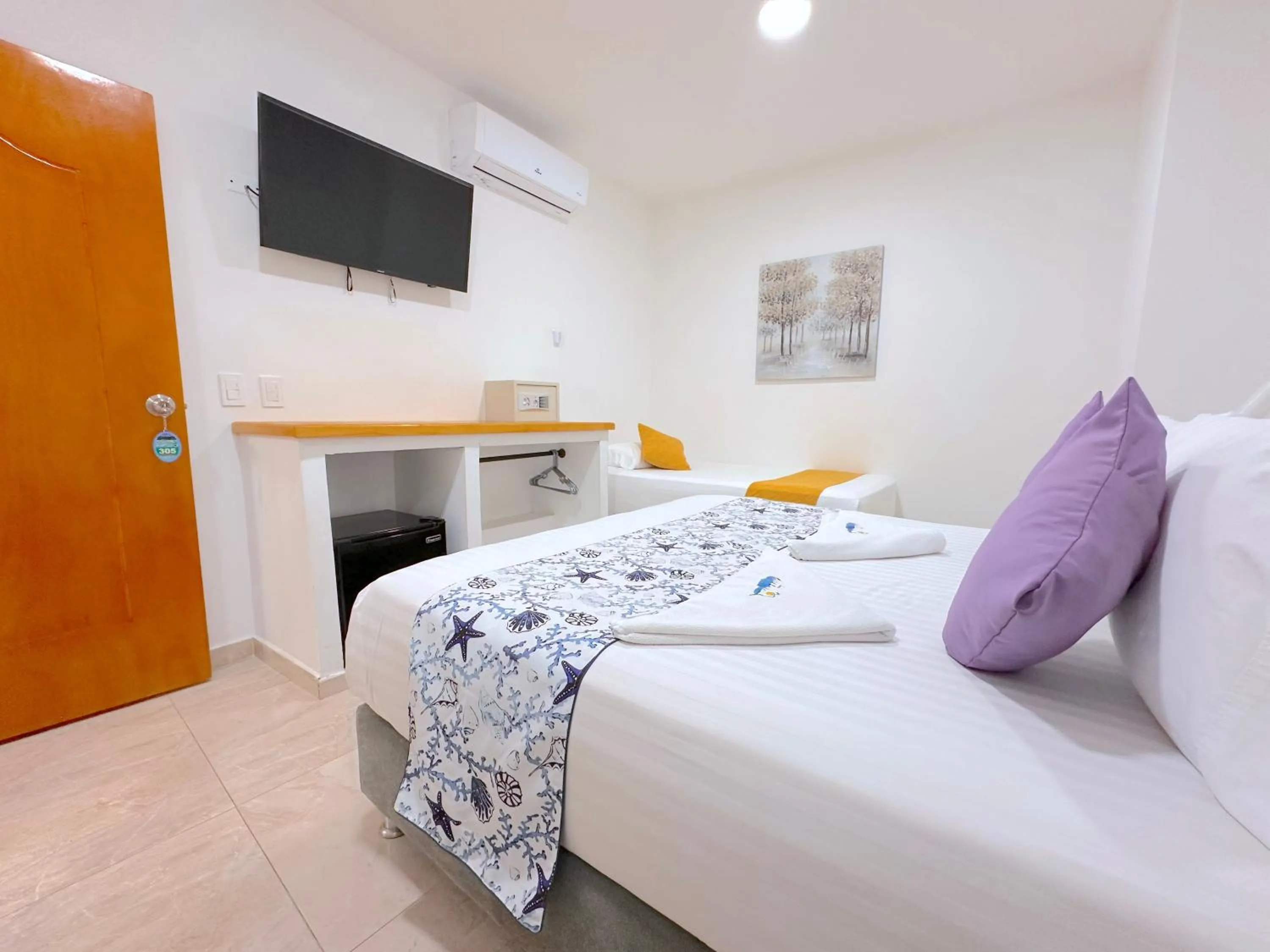 Bed in Hotel Grand Caribe