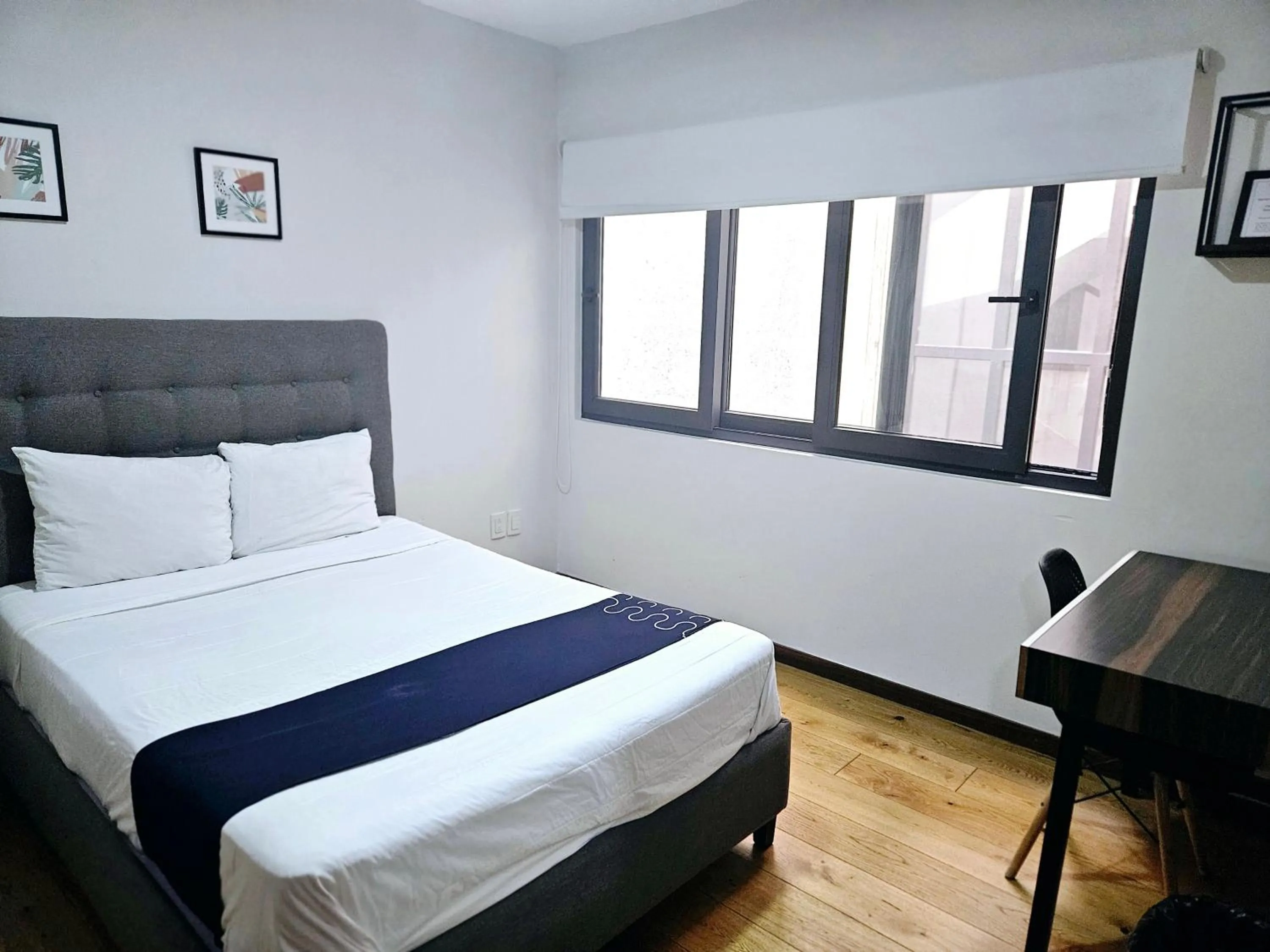 Photo of the whole room, Bed in Singular Sócrates