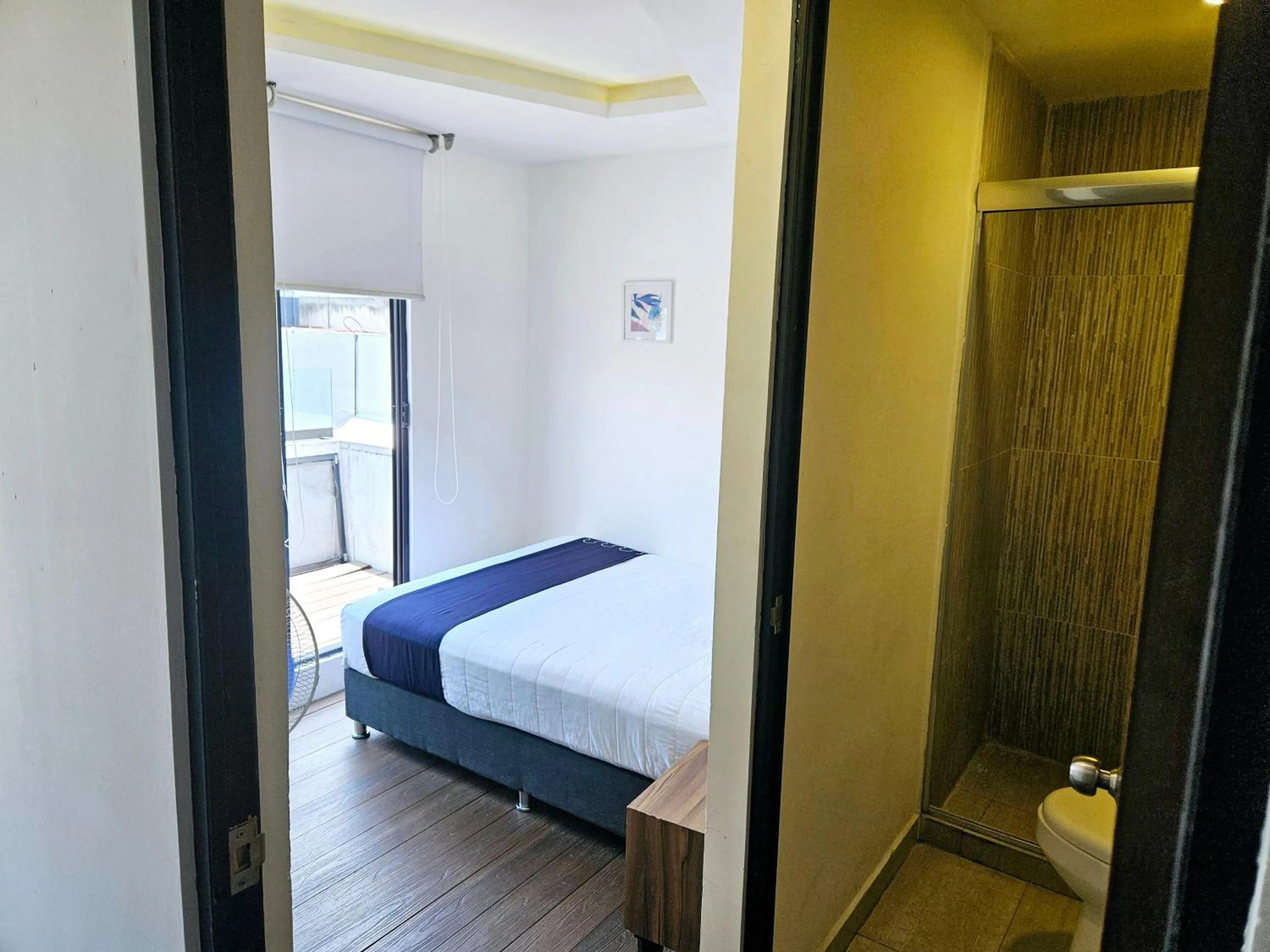 Photo of the whole room, Bed in Singular Sócrates