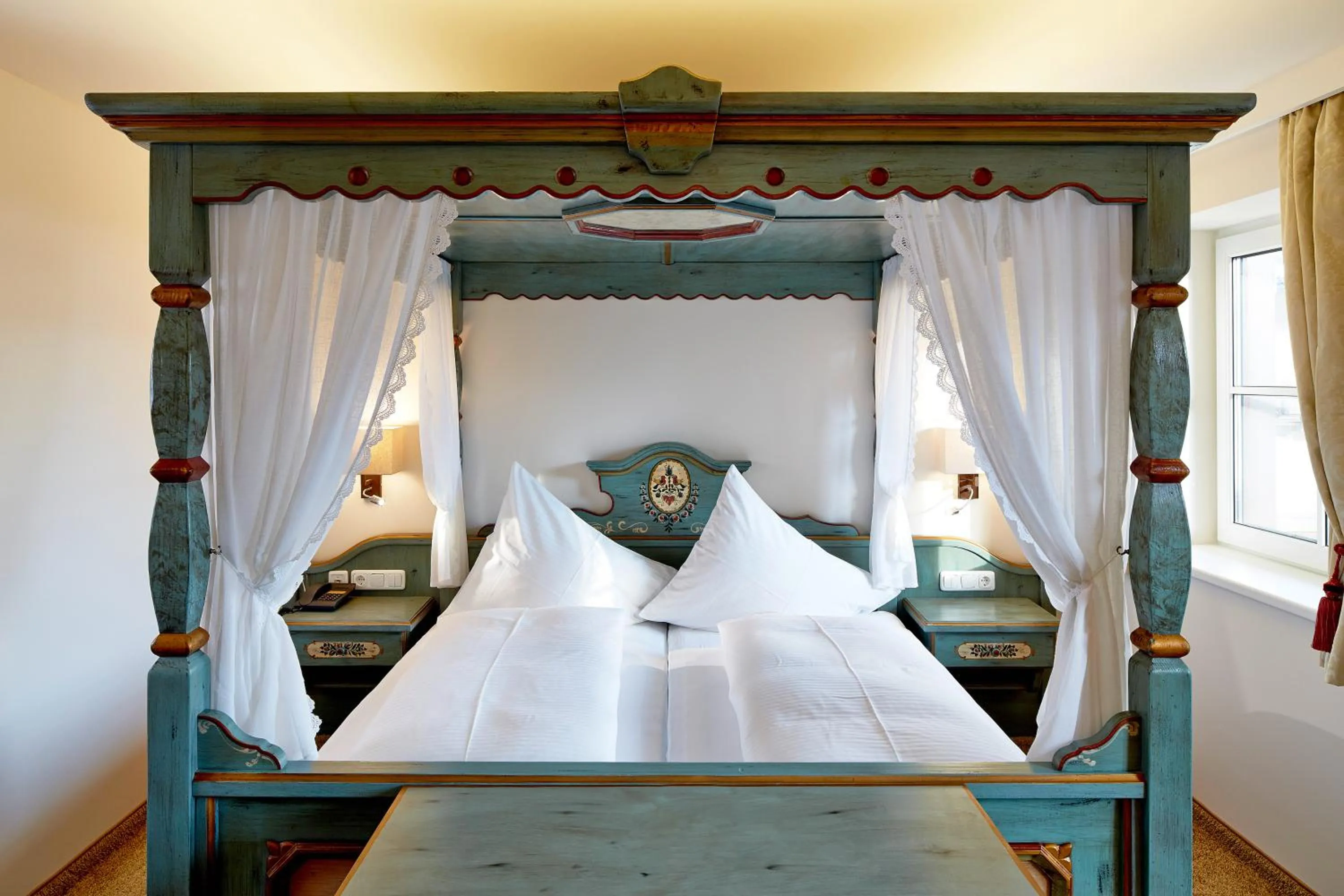 Bed in Hotel Flatscher