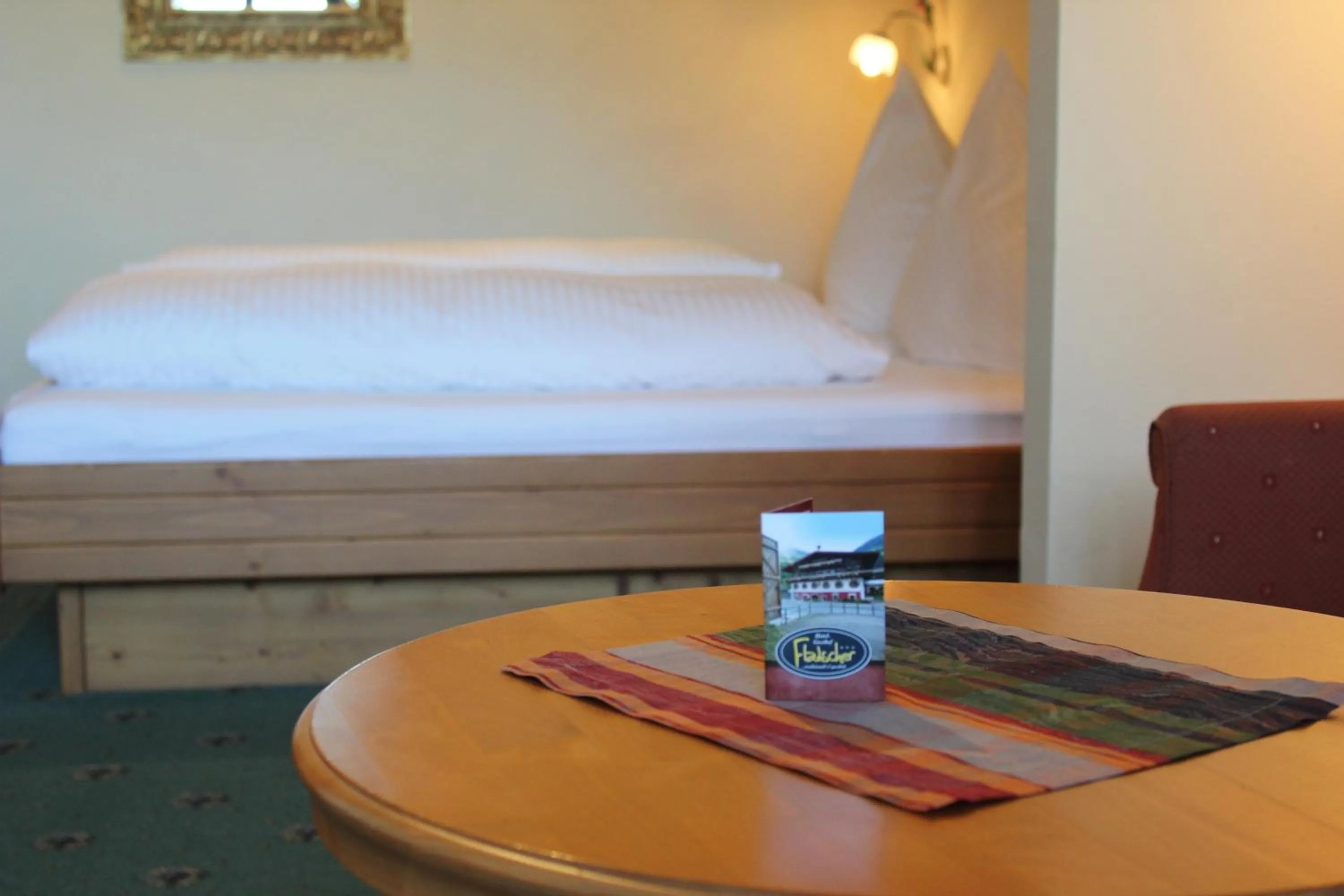 Bed in Hotel Flatscher