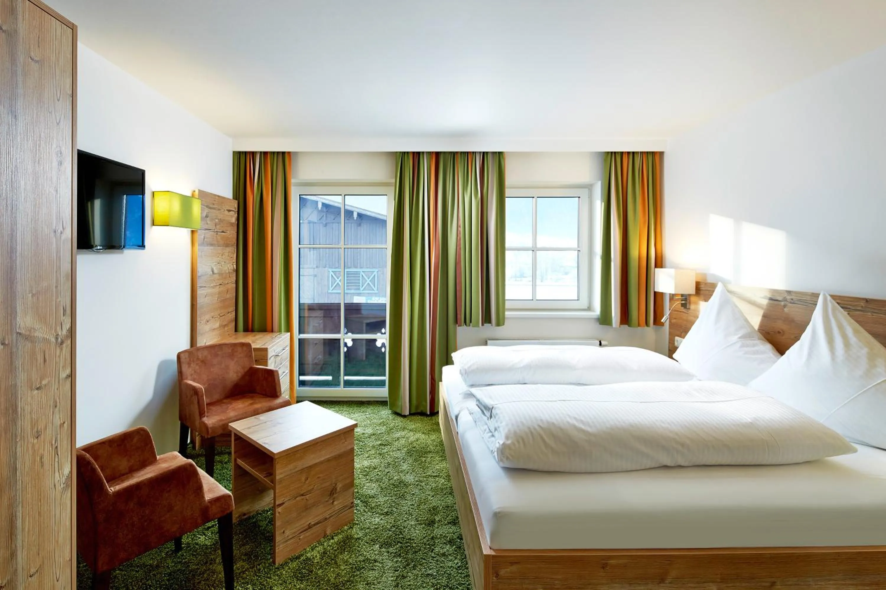 Bed in Hotel Flatscher