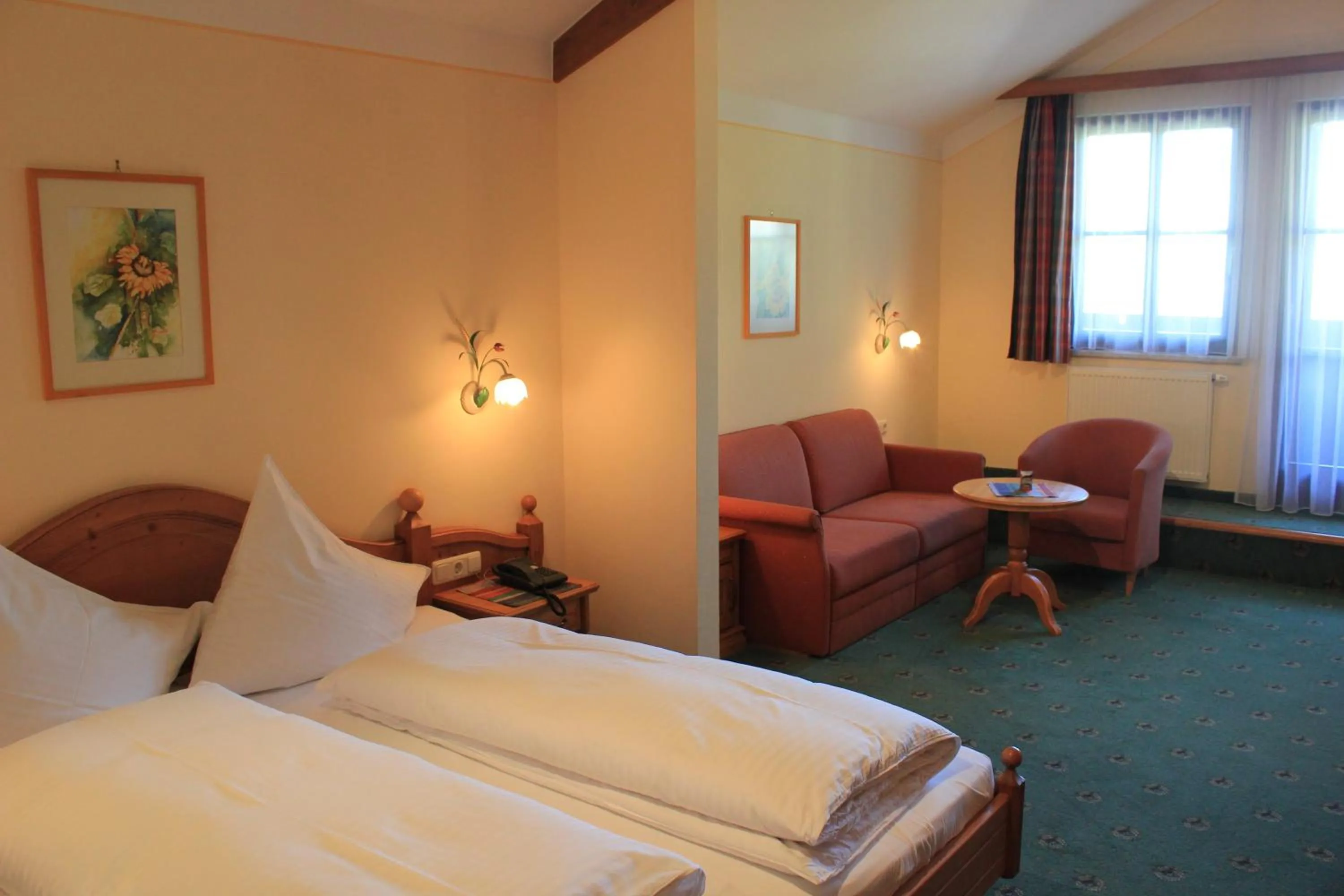 Bed in Hotel Flatscher