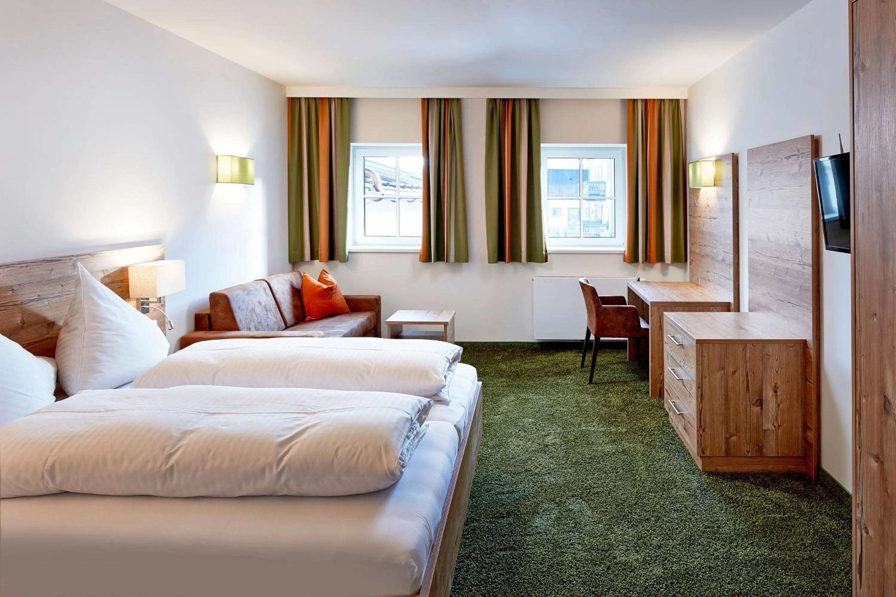 Bed in Hotel Flatscher