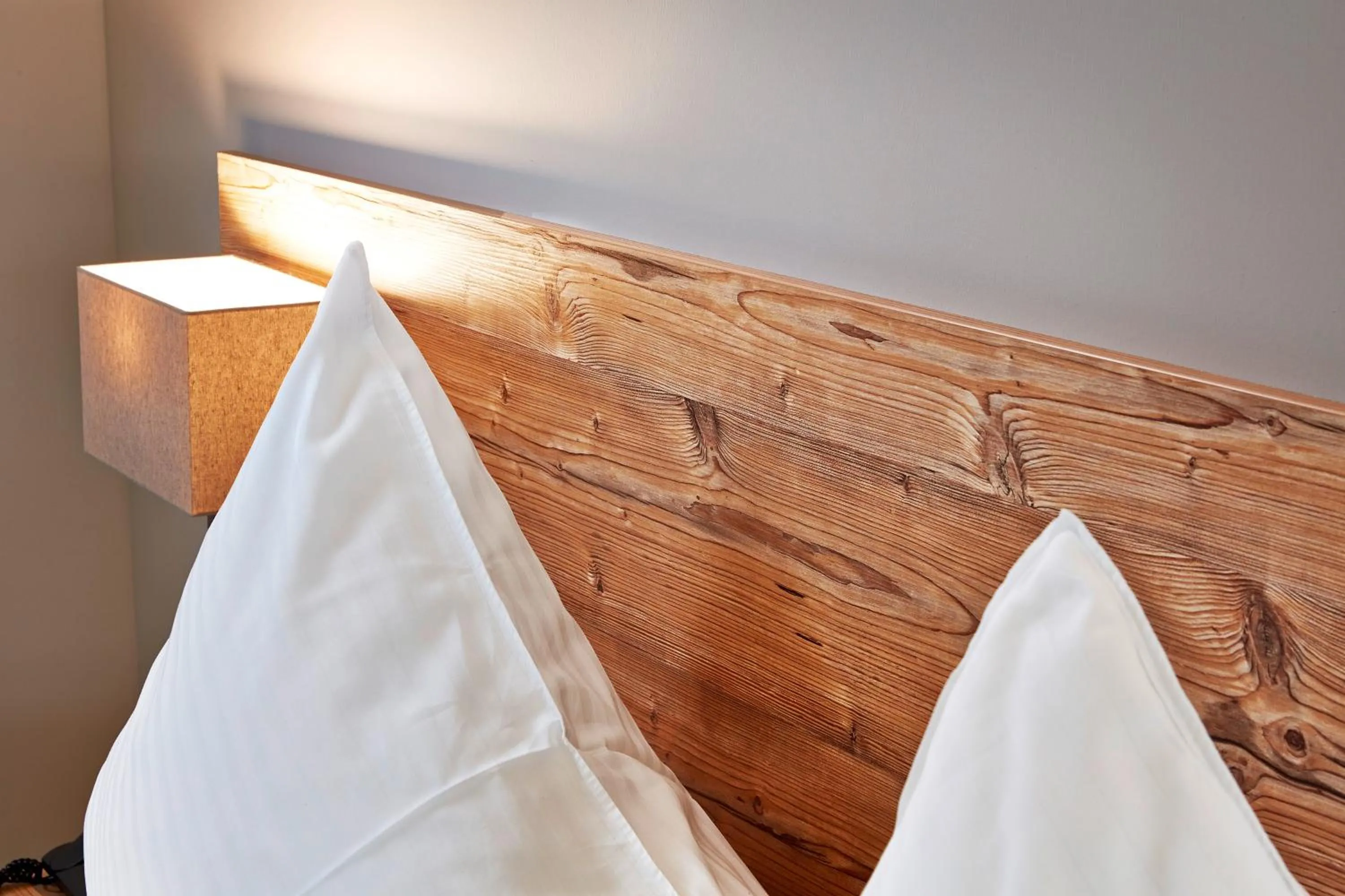 Bed in Hotel Flatscher