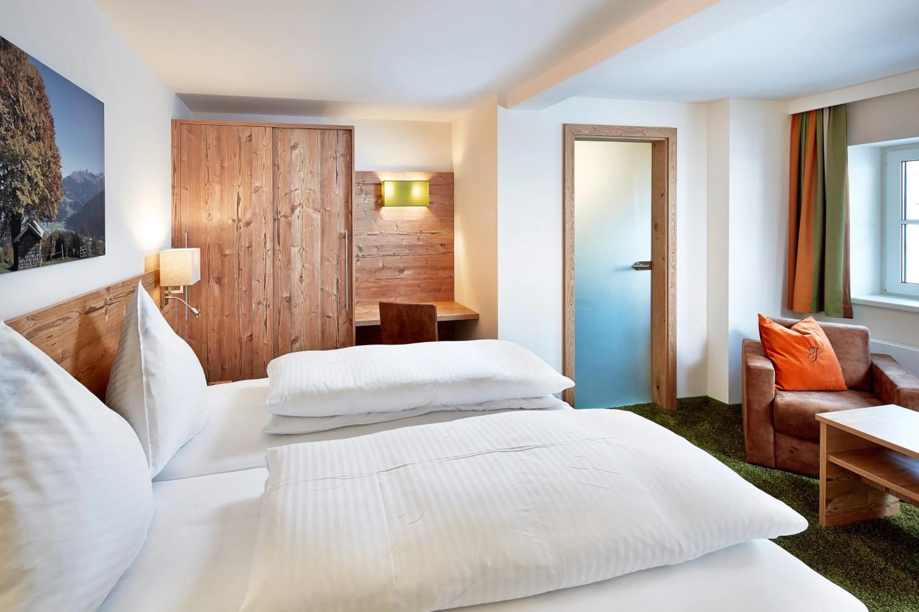 Bed in Hotel Flatscher