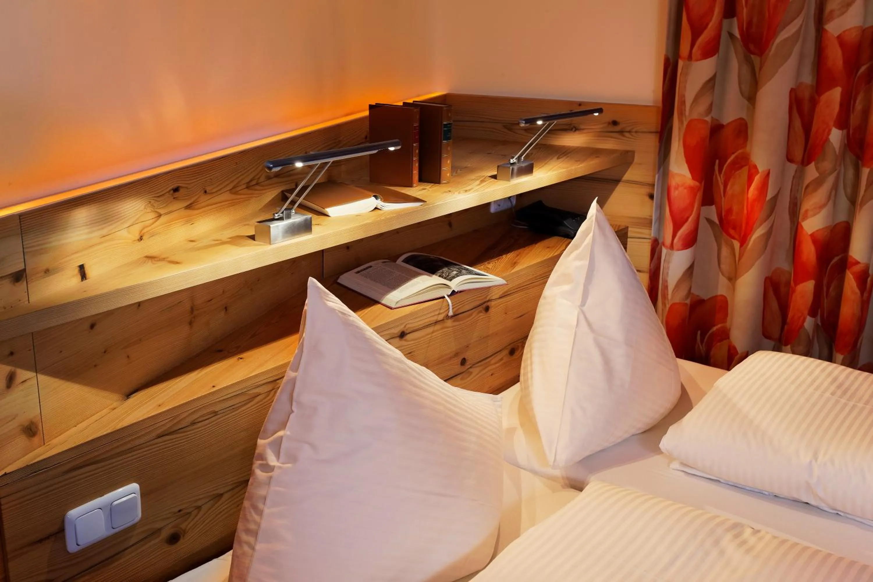 Bed in Hotel Flatscher