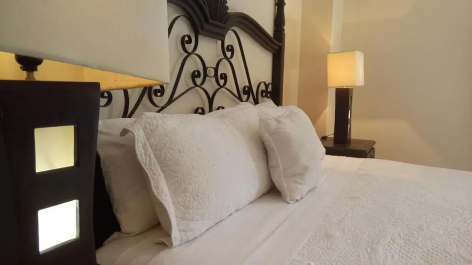 Bed in Hotel Hacienda los Narcisos