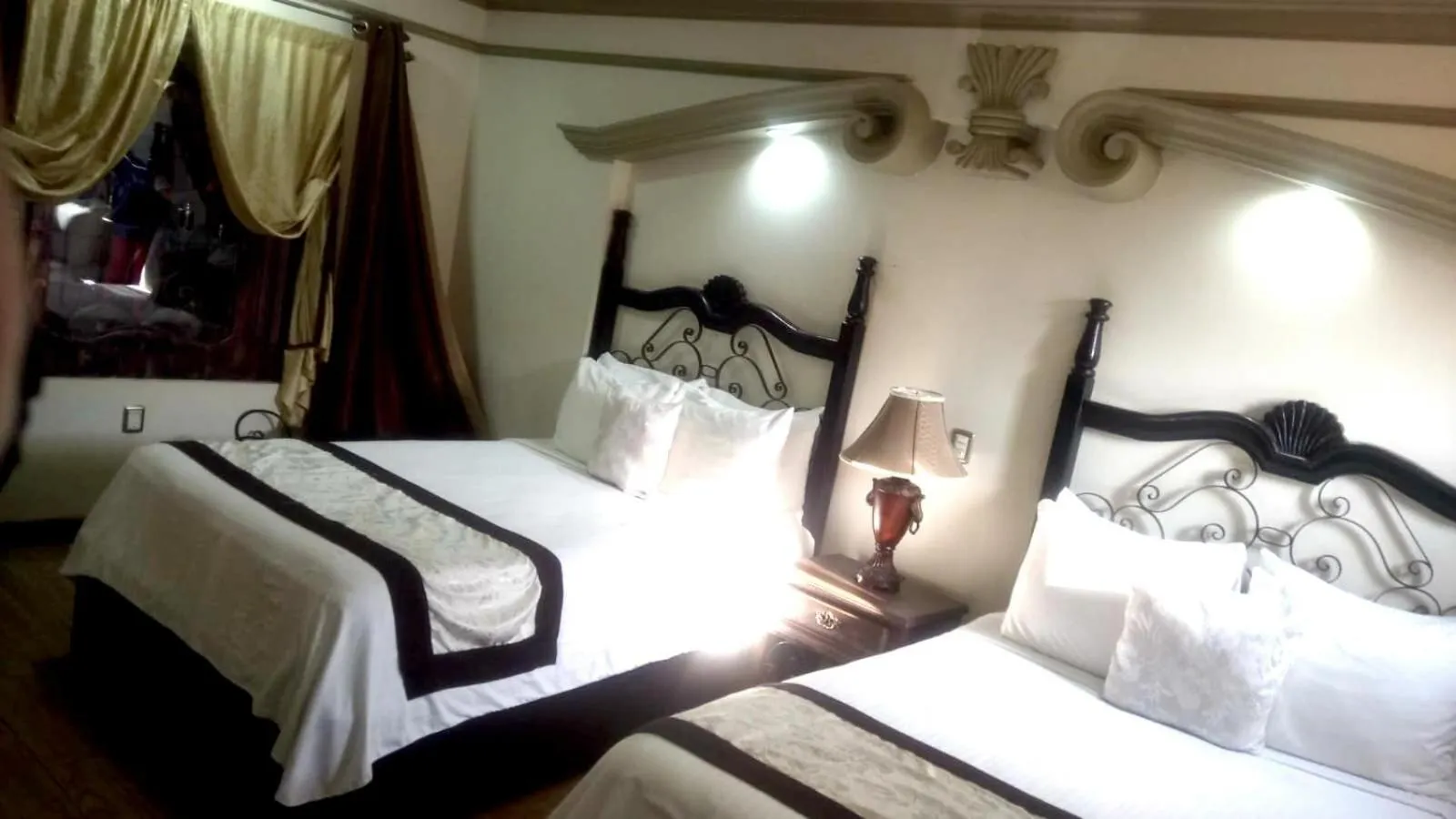 Bed in Hotel Hacienda los Narcisos