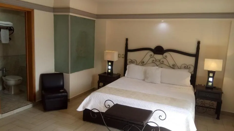 Photo of the whole room, Bed in Hotel Hacienda los Narcisos
