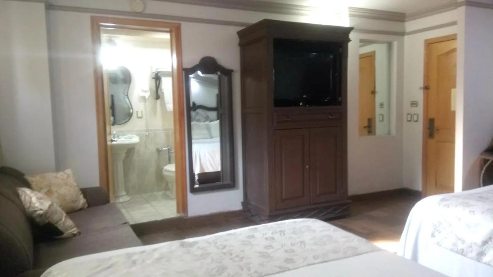 Bed in Hotel Hacienda los Narcisos