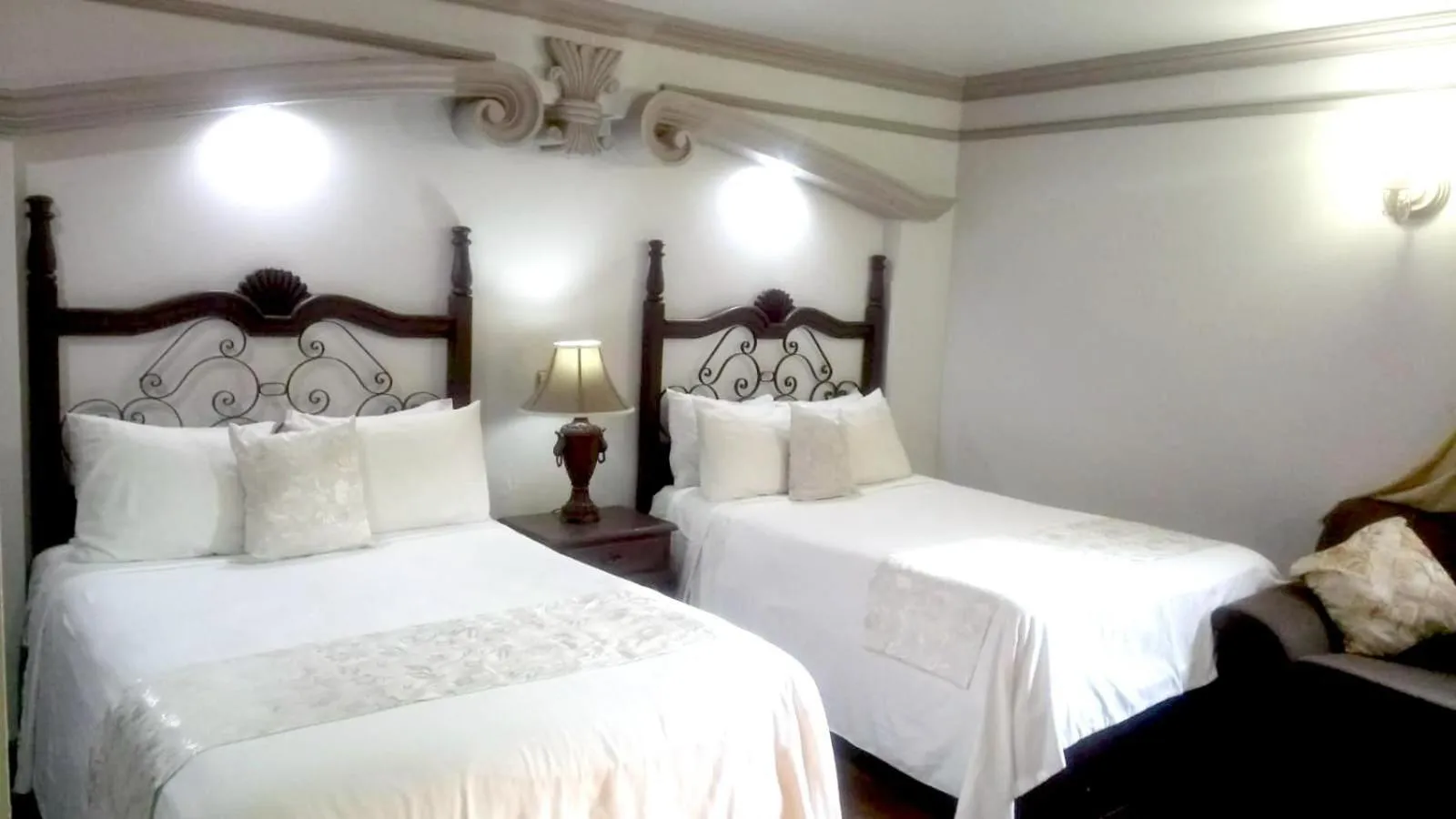 Bed in Hotel Hacienda los Narcisos