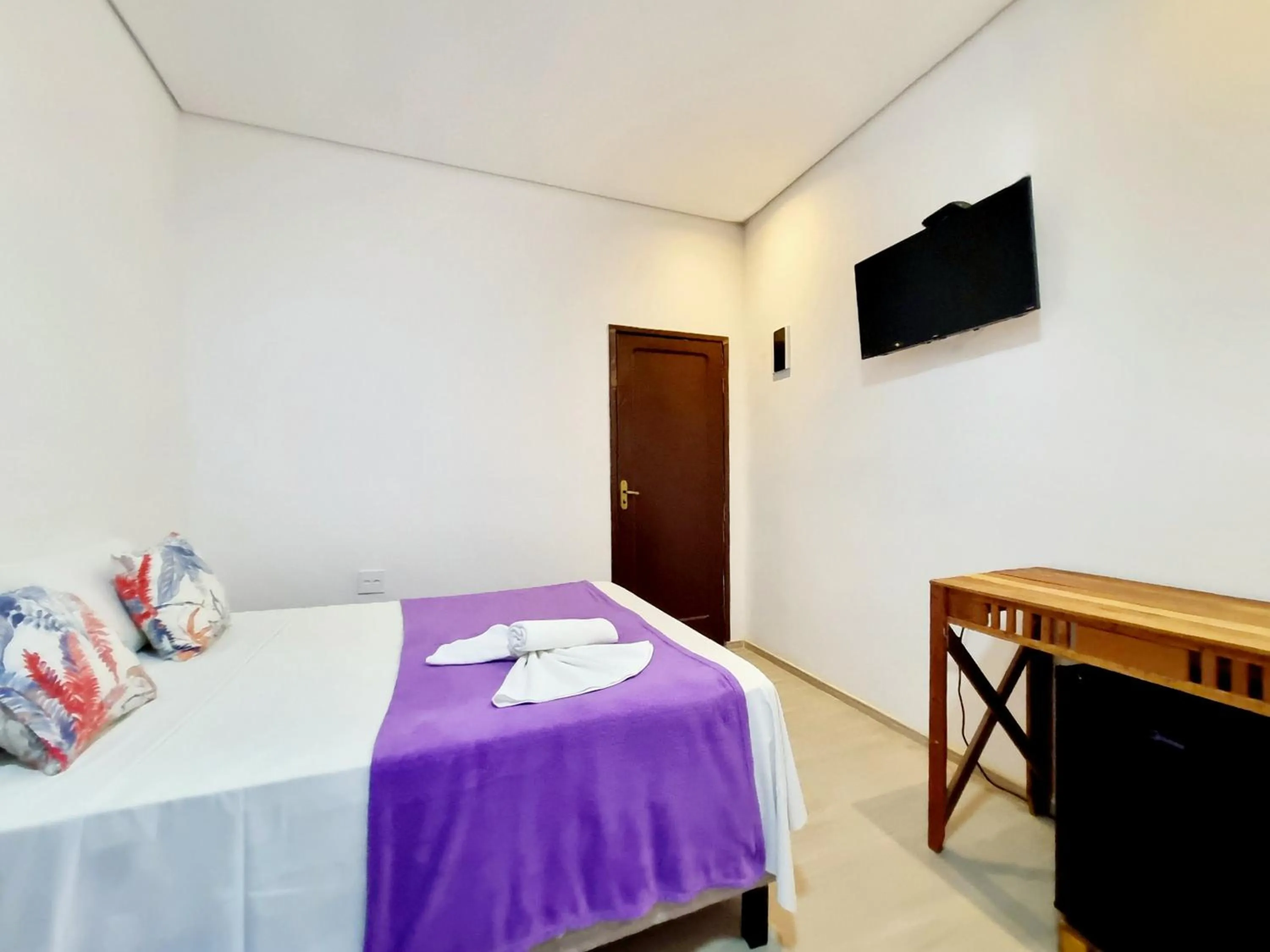 Bed in Pousada Delta Mar Maresias