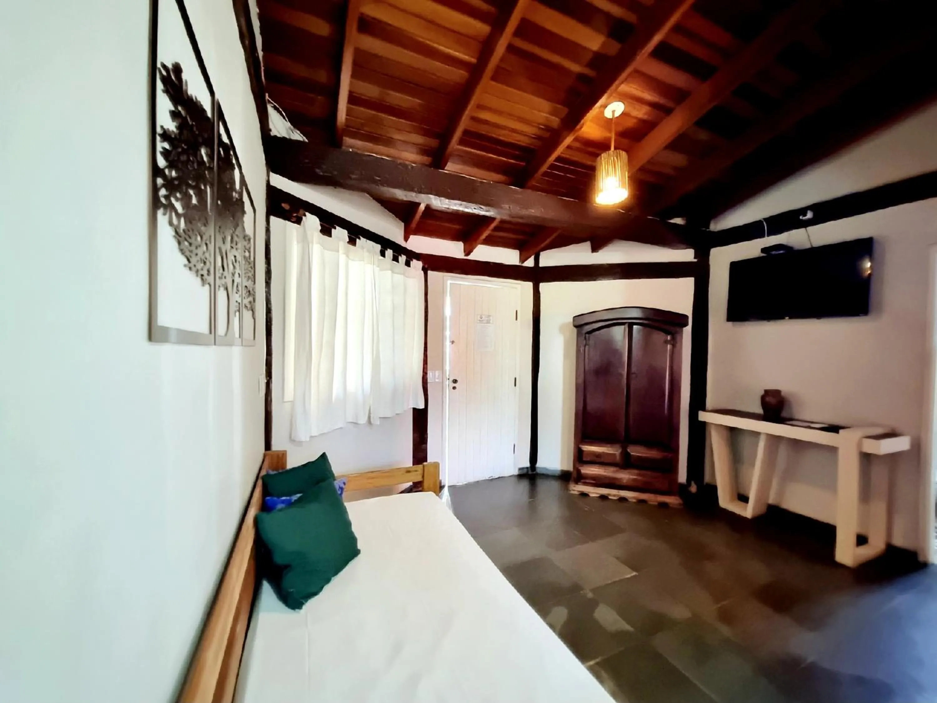 Bed in Pousada Delta Mar Maresias