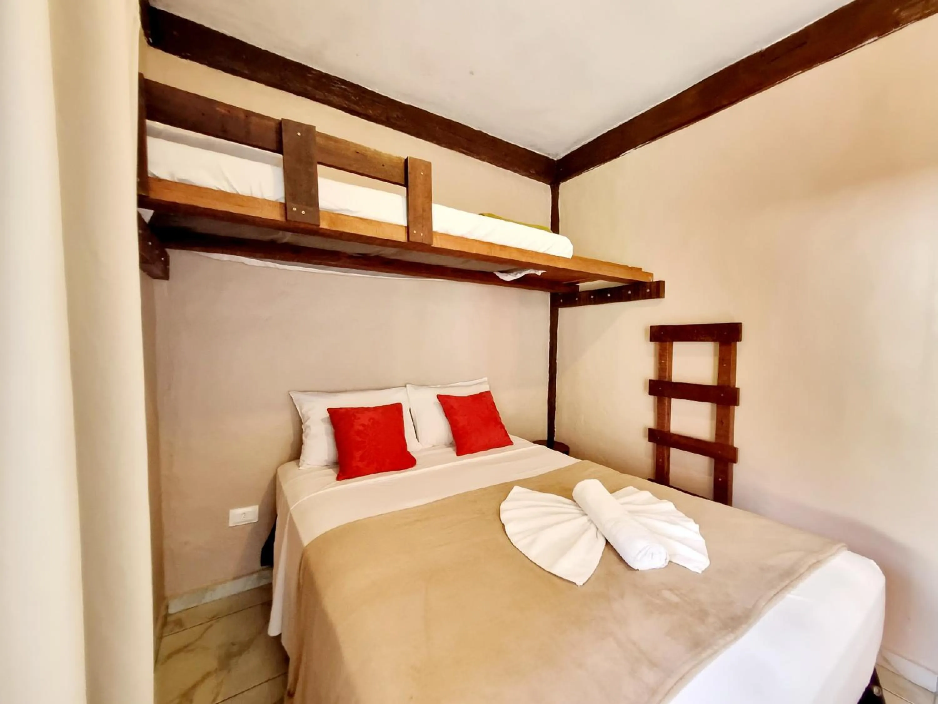 Bed in Pousada Delta Mar Maresias