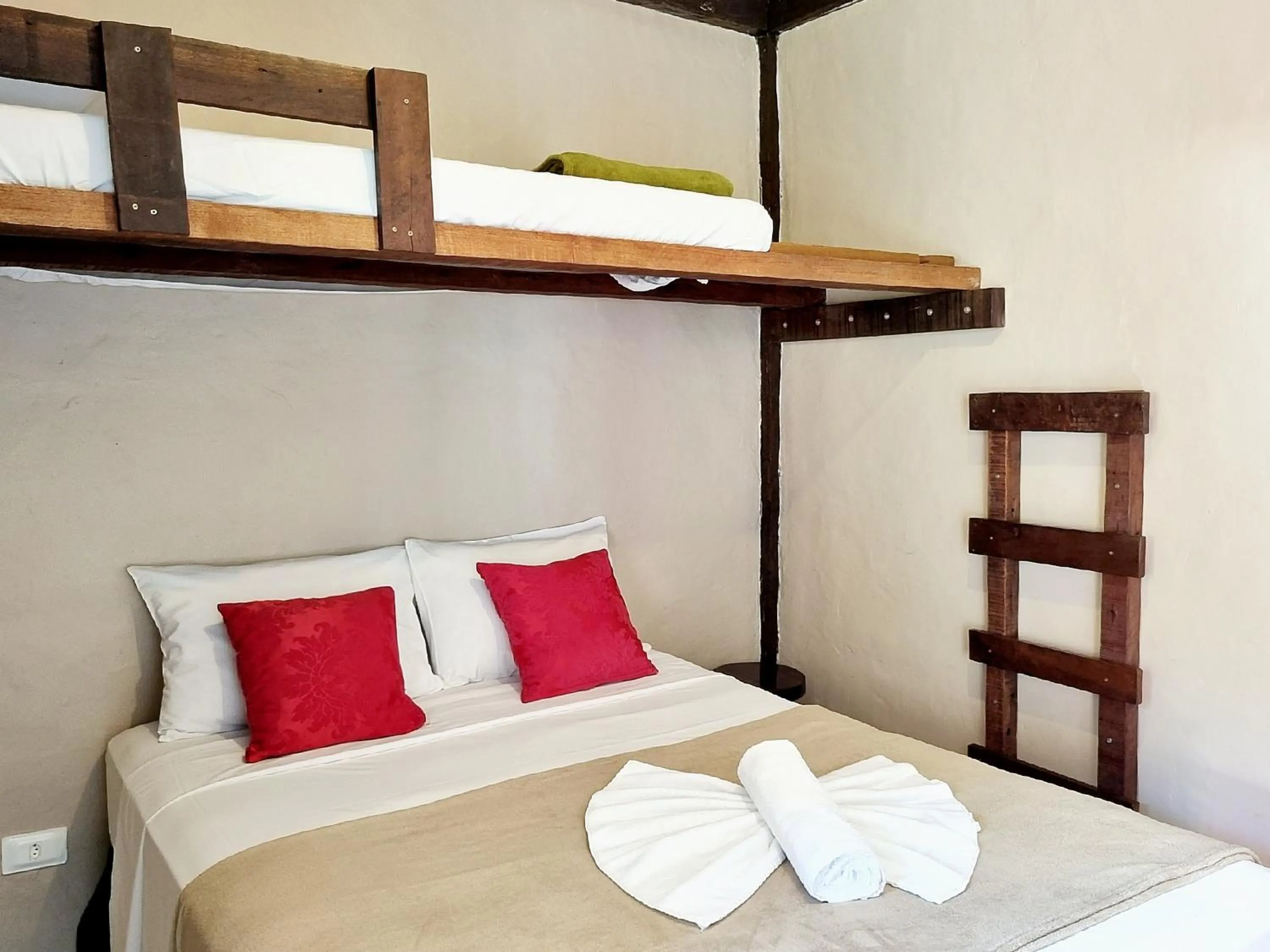 Bed in Pousada Delta Mar Maresias