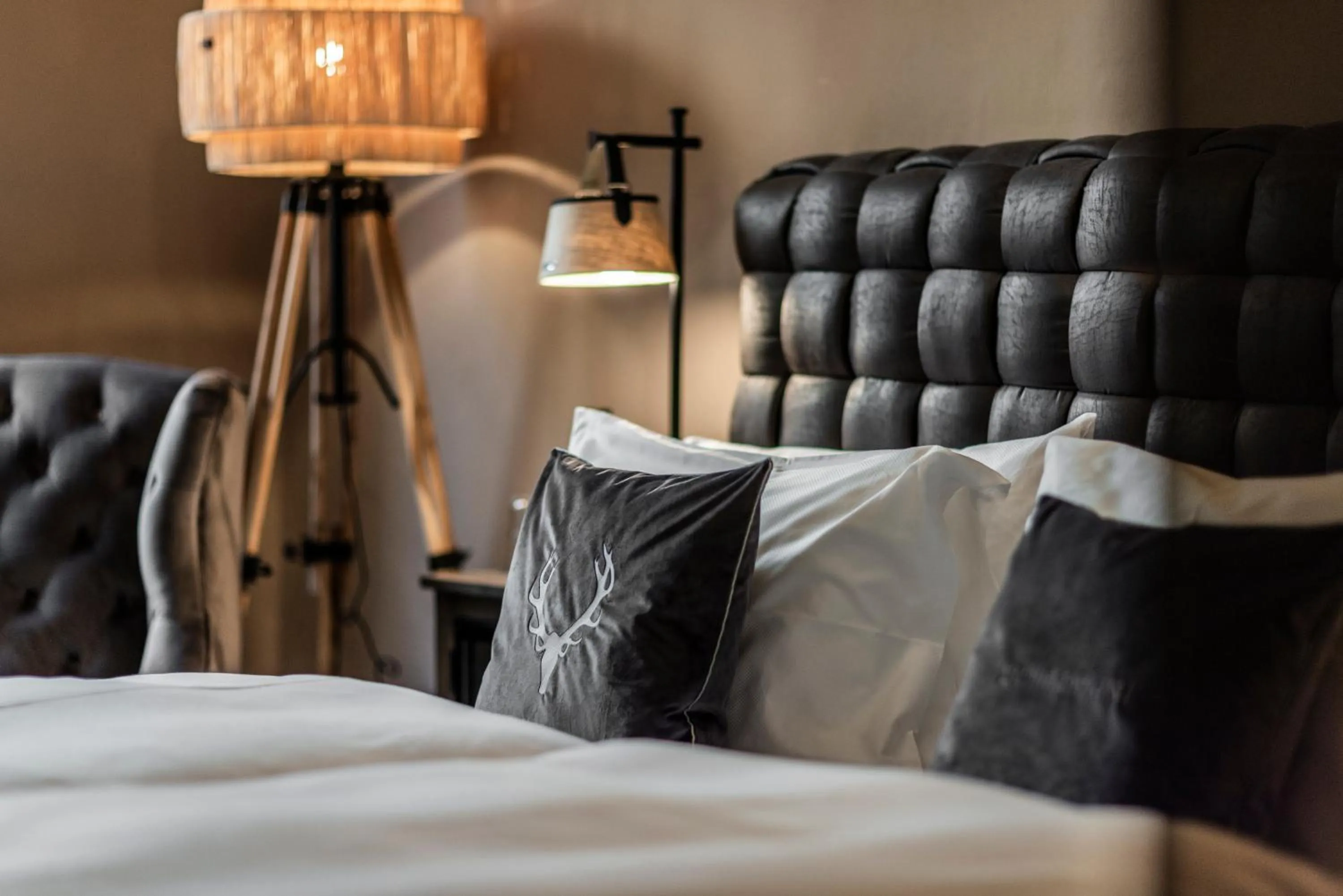 Bed in Boutiquehotel Weisses Rössl