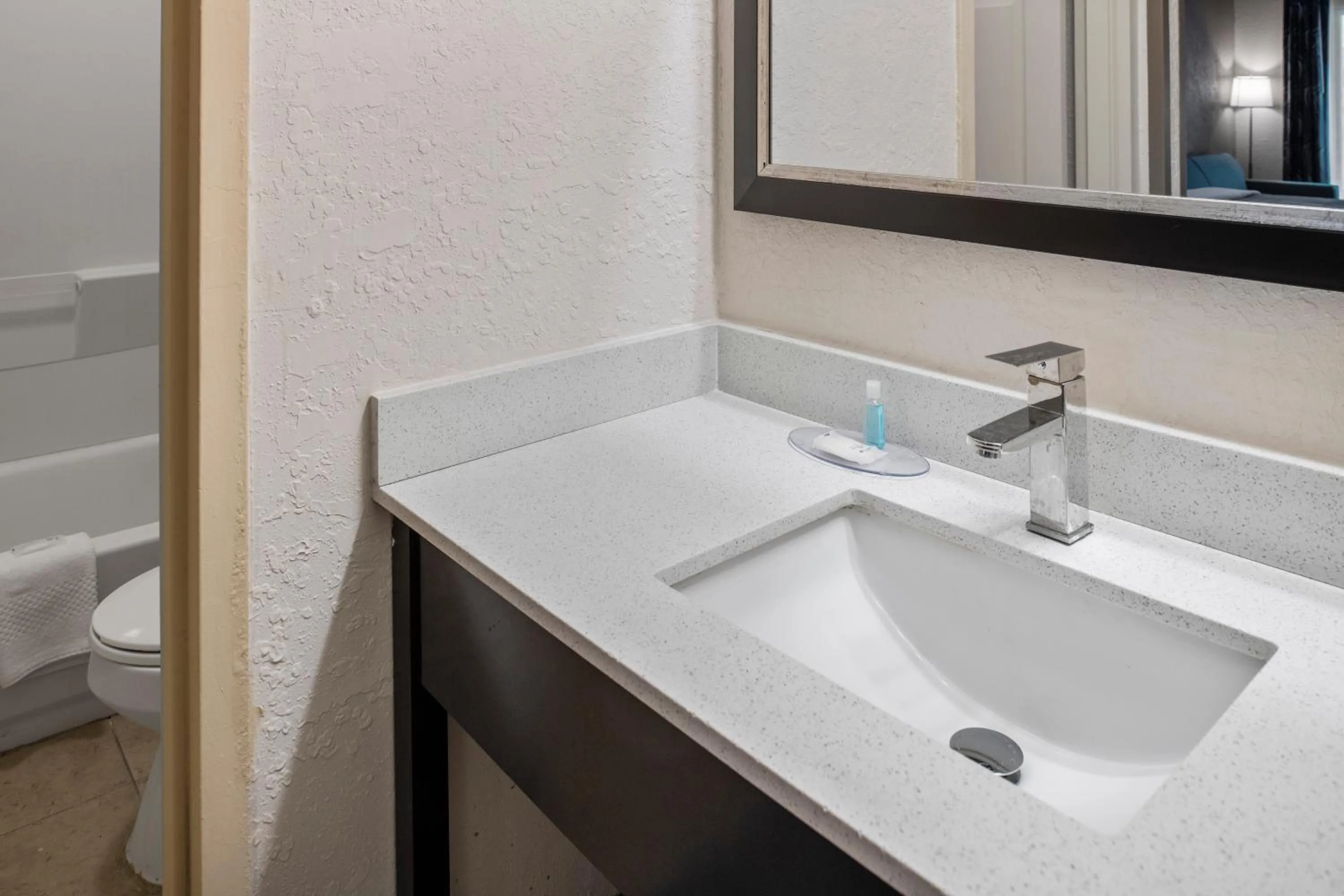 Bathroom in Suburban Studios Hotel Kingsland Near I-95