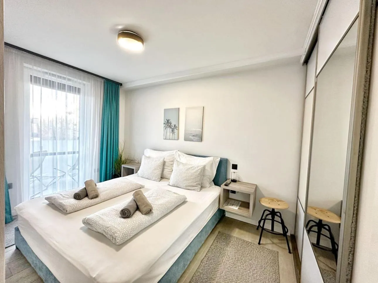 Bed in Marina Apartment by Dora