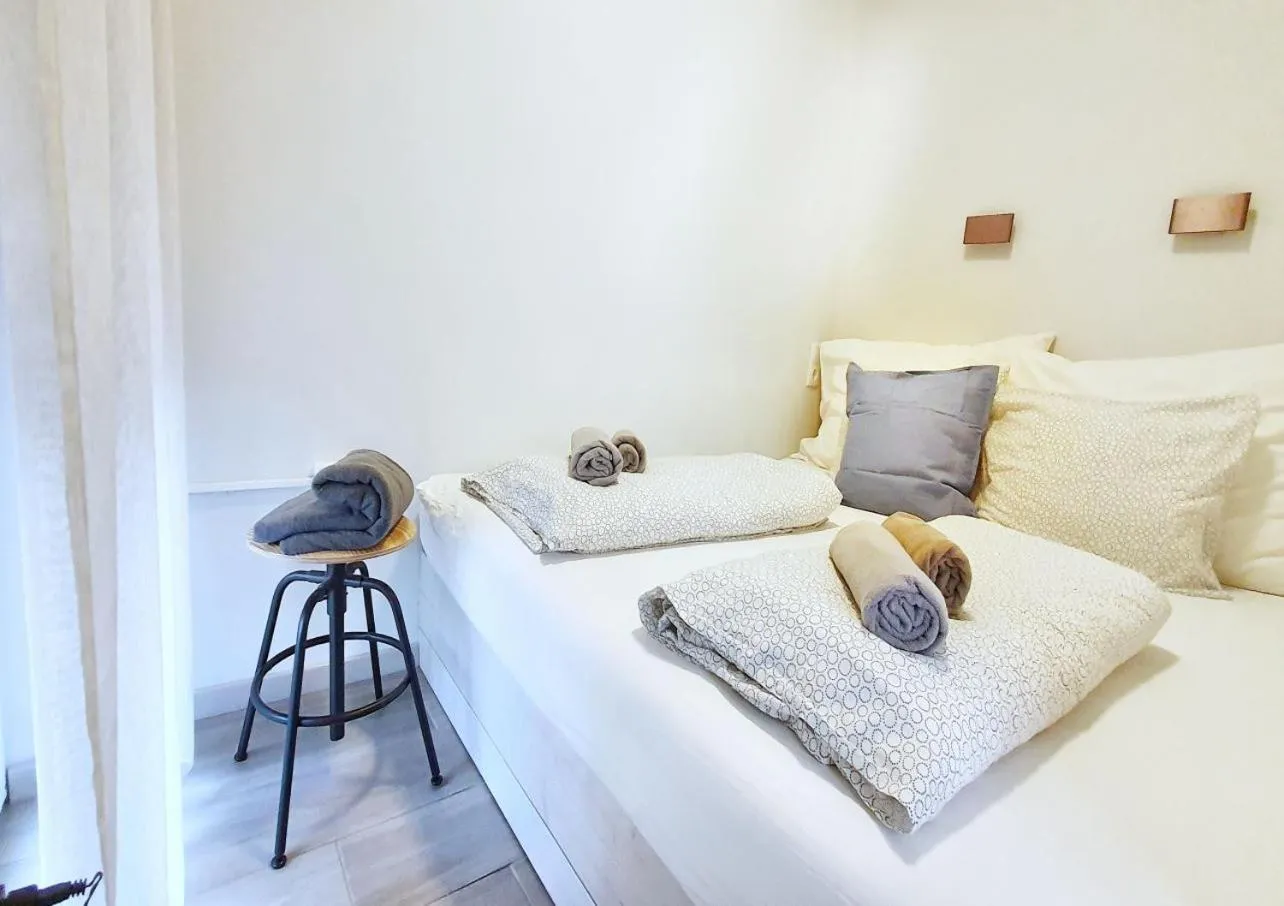 Bed in Marina Apartment by Dora