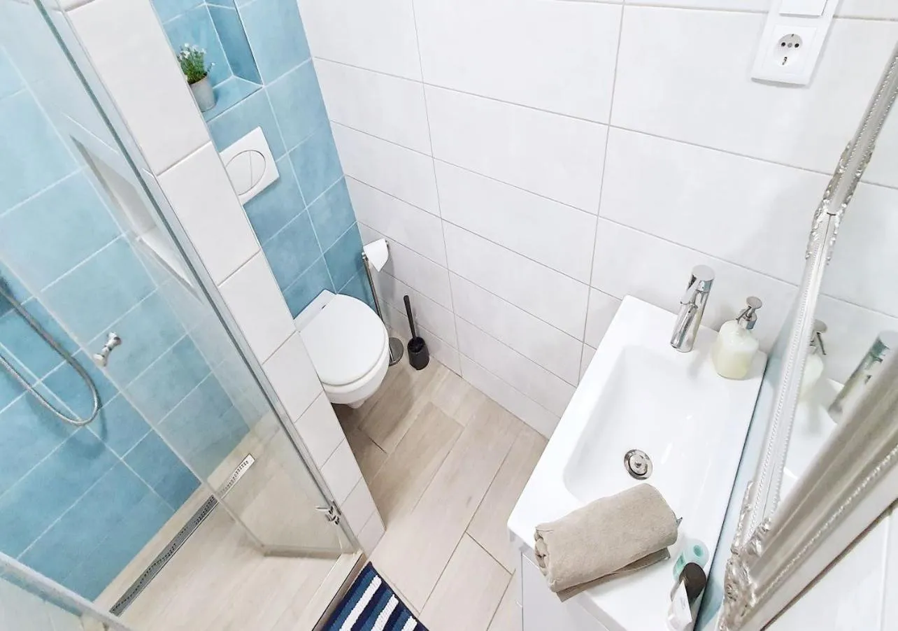 Shower in Marina Apartment by Dora