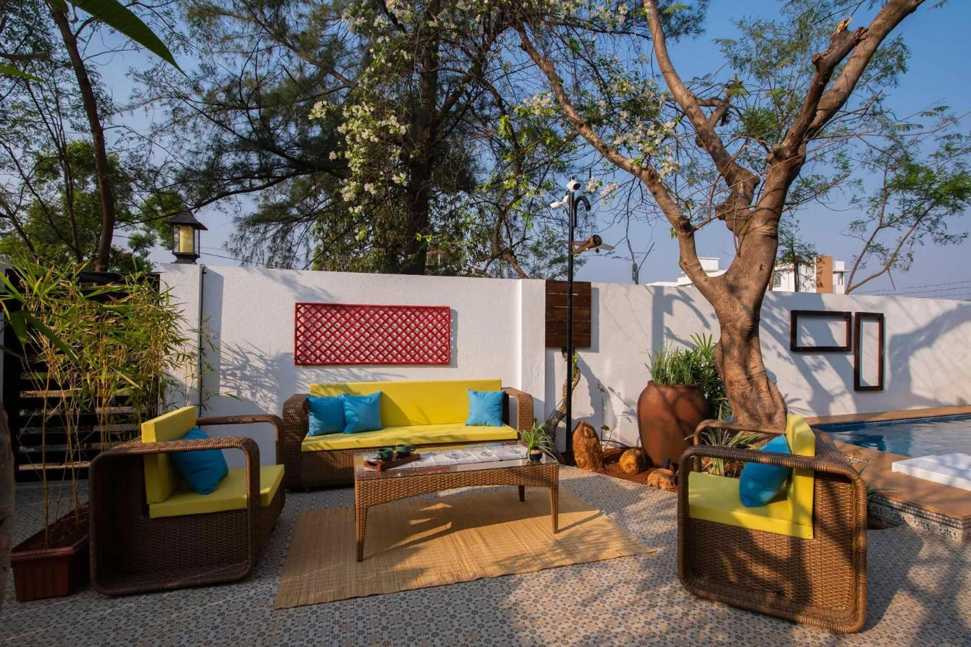 Seating area in El Cottage by StayVista - An enchanting escape with Scenic views, Colonial decor & Private plunge pool
