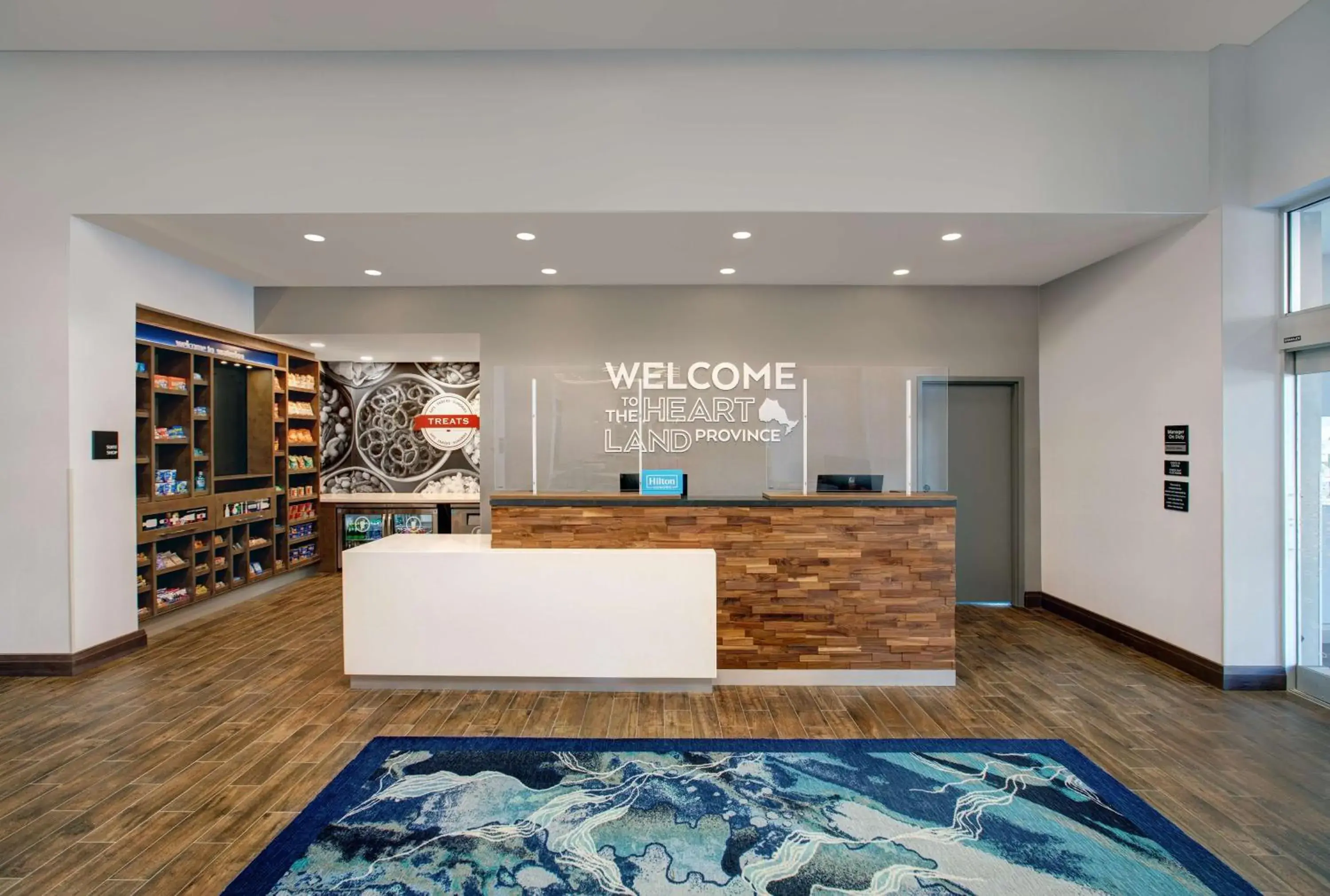 Lobby or reception in Hampton Inn & Suites By Hilton Waterloo St. Jacobs Lobby or reception in Hampton Inn & Suites By Hilton Waterloo St. Jacobs