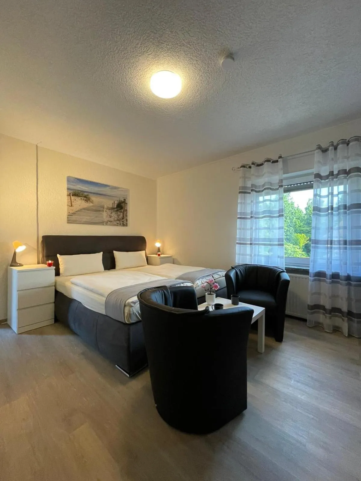 Photo of the whole room, Bed in Hotel Ammerländer Stuben