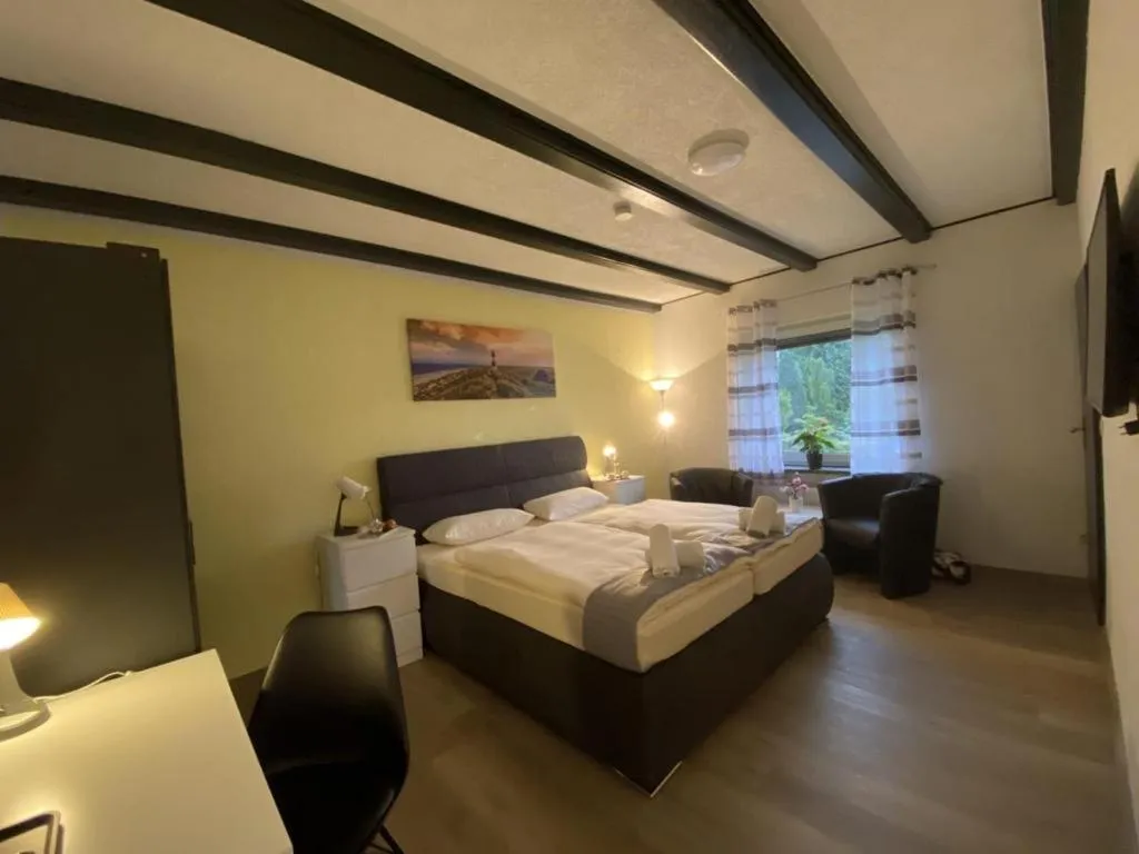 Bed in Hotel Ammerländer Stuben