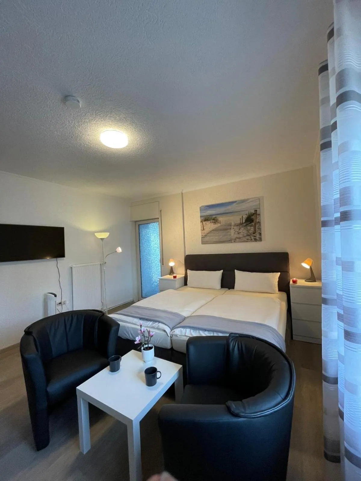 Photo of the whole room, Bed in Hotel Ammerländer Stuben