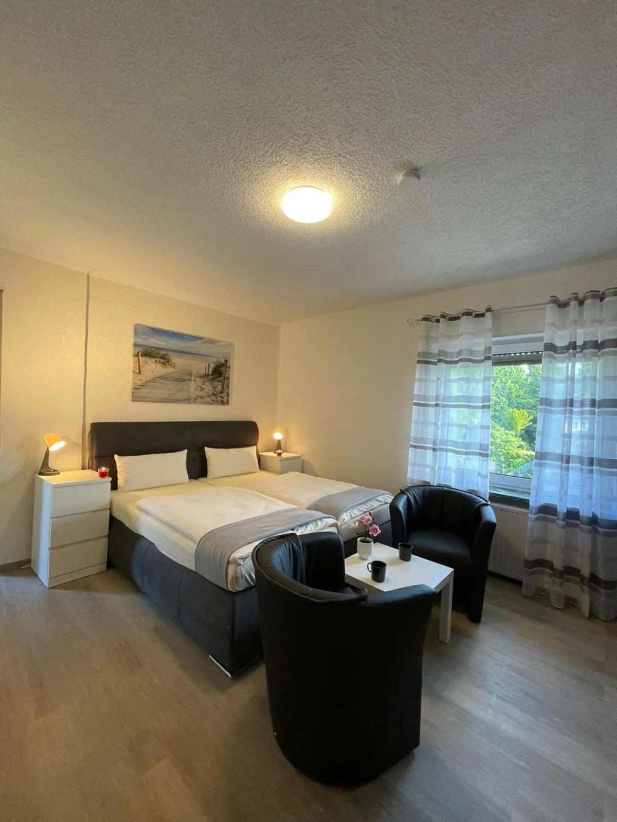 Photo of the whole room, Bed in Hotel Ammerländer Stuben