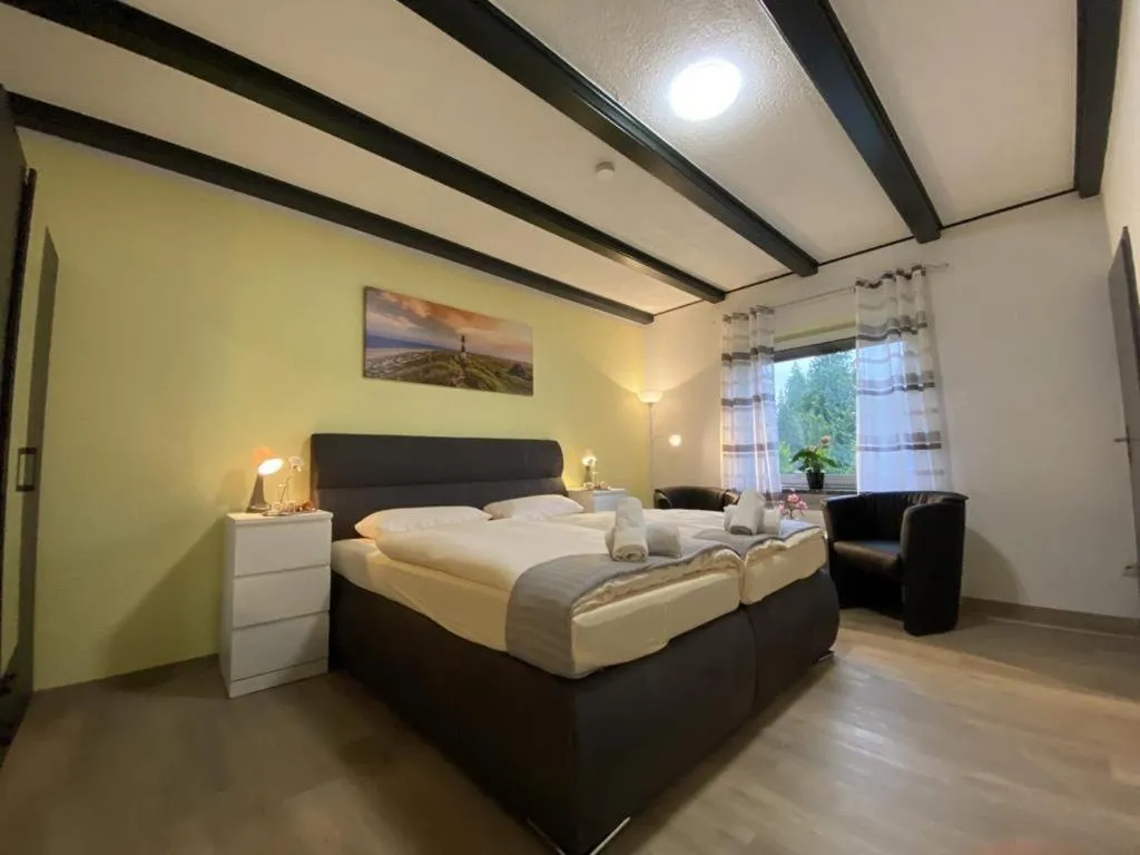 Bed in Hotel Ammerländer Stuben