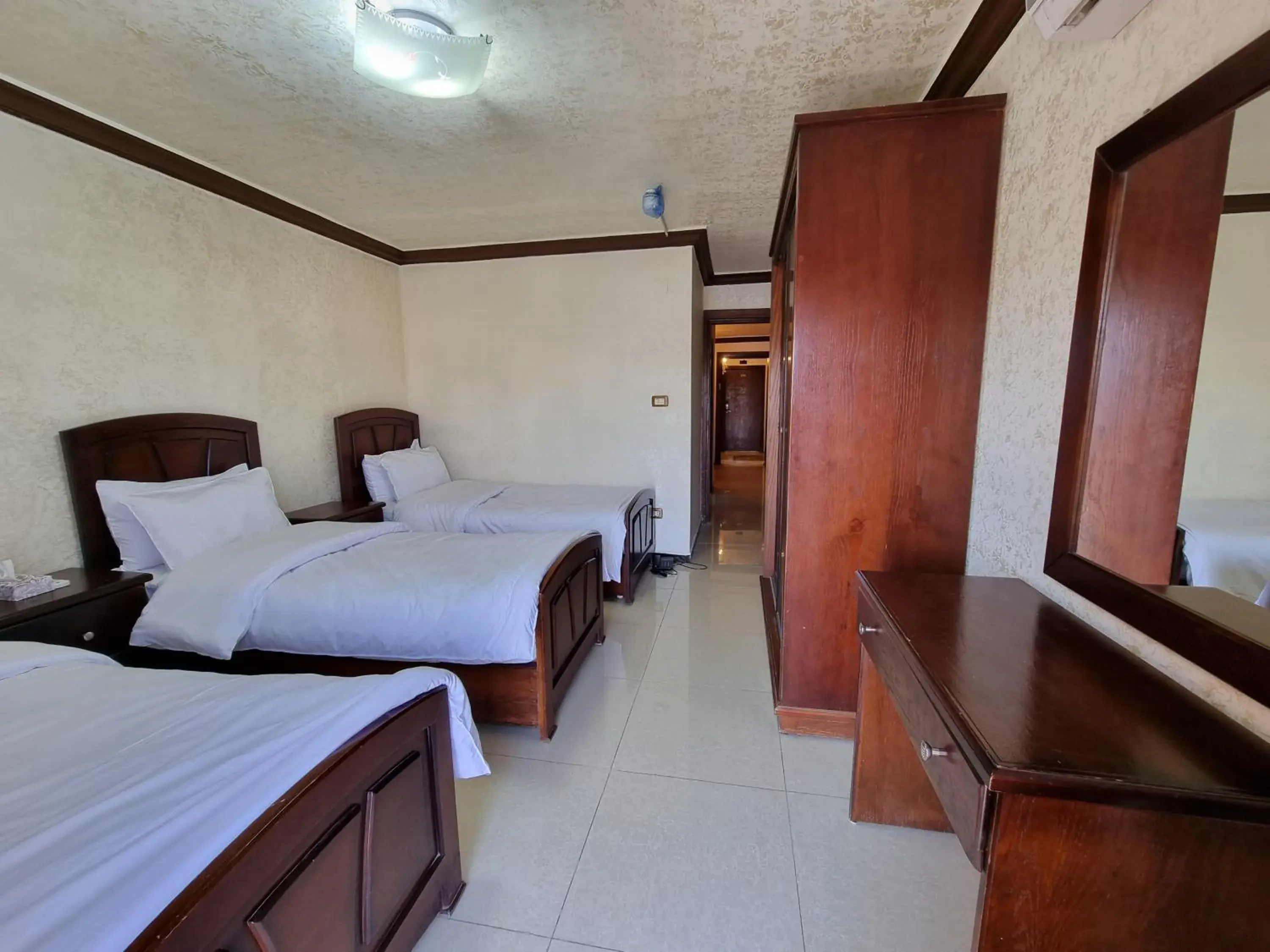 Triple Room with City View in Nahas Plaza Triple Room with City View in Nahas Plaza