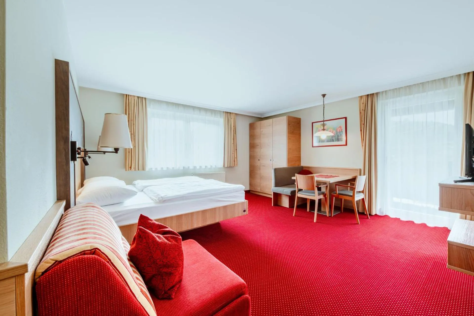 Dining area, Bed in Harmls Aparthotel