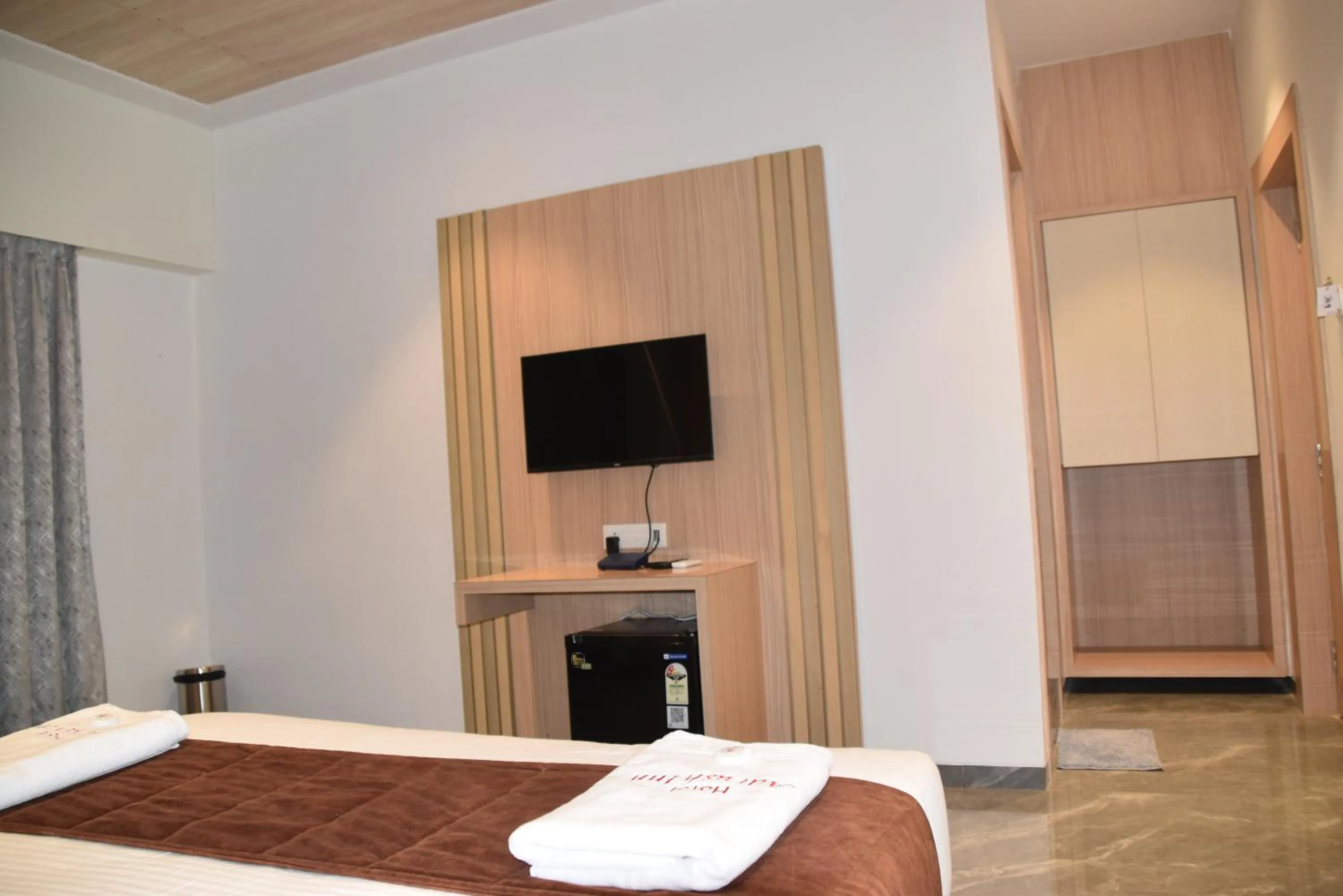 Bed in Hotel Aarush Inn