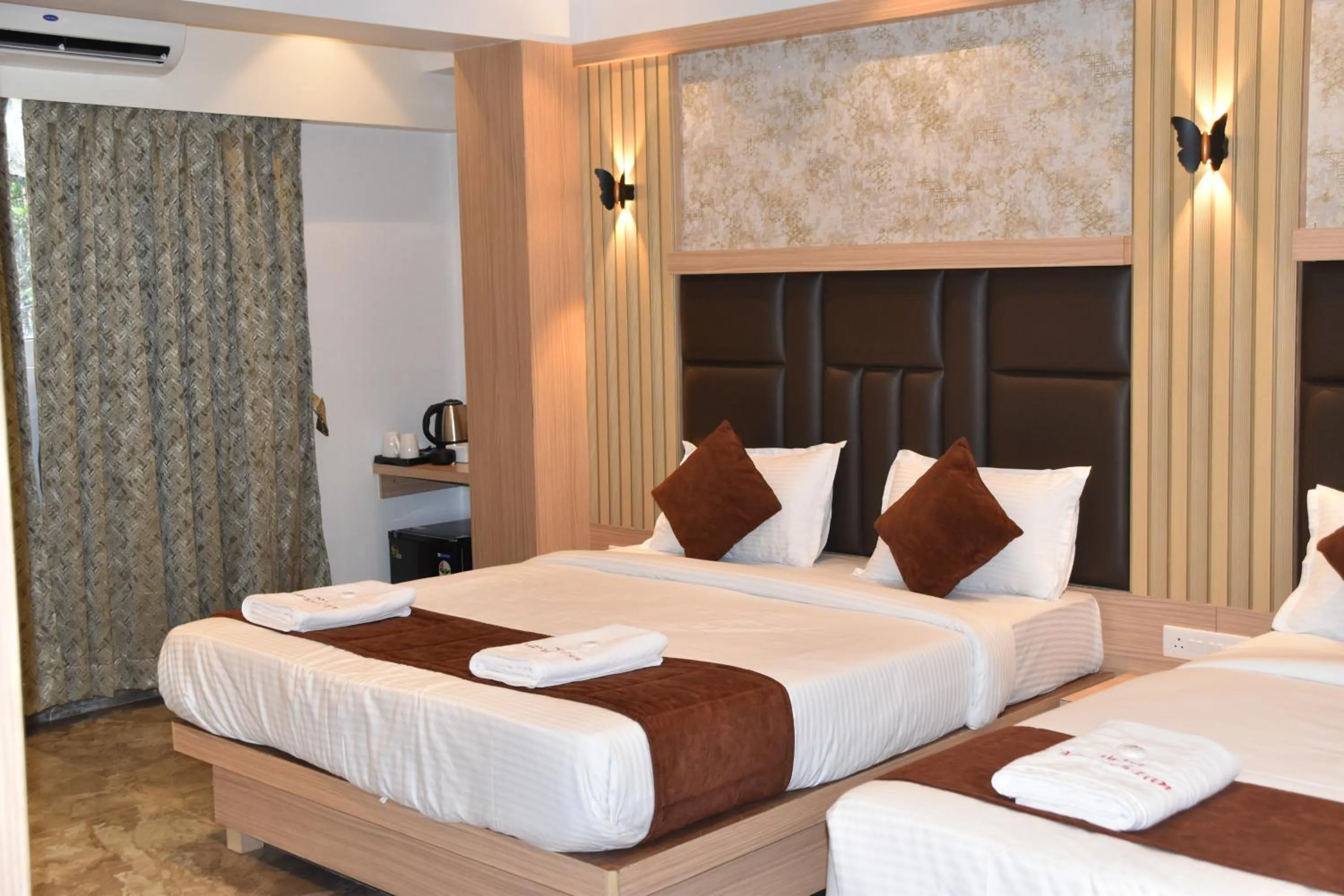 Bed in Hotel Aarush Inn