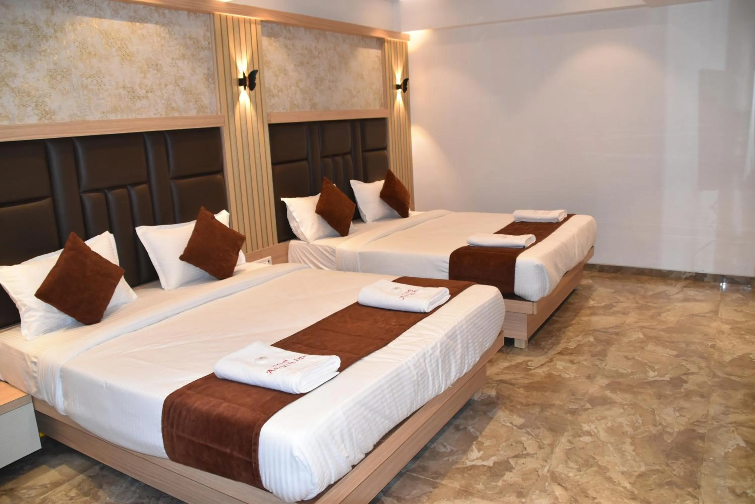 Bed in Hotel Aarush Inn