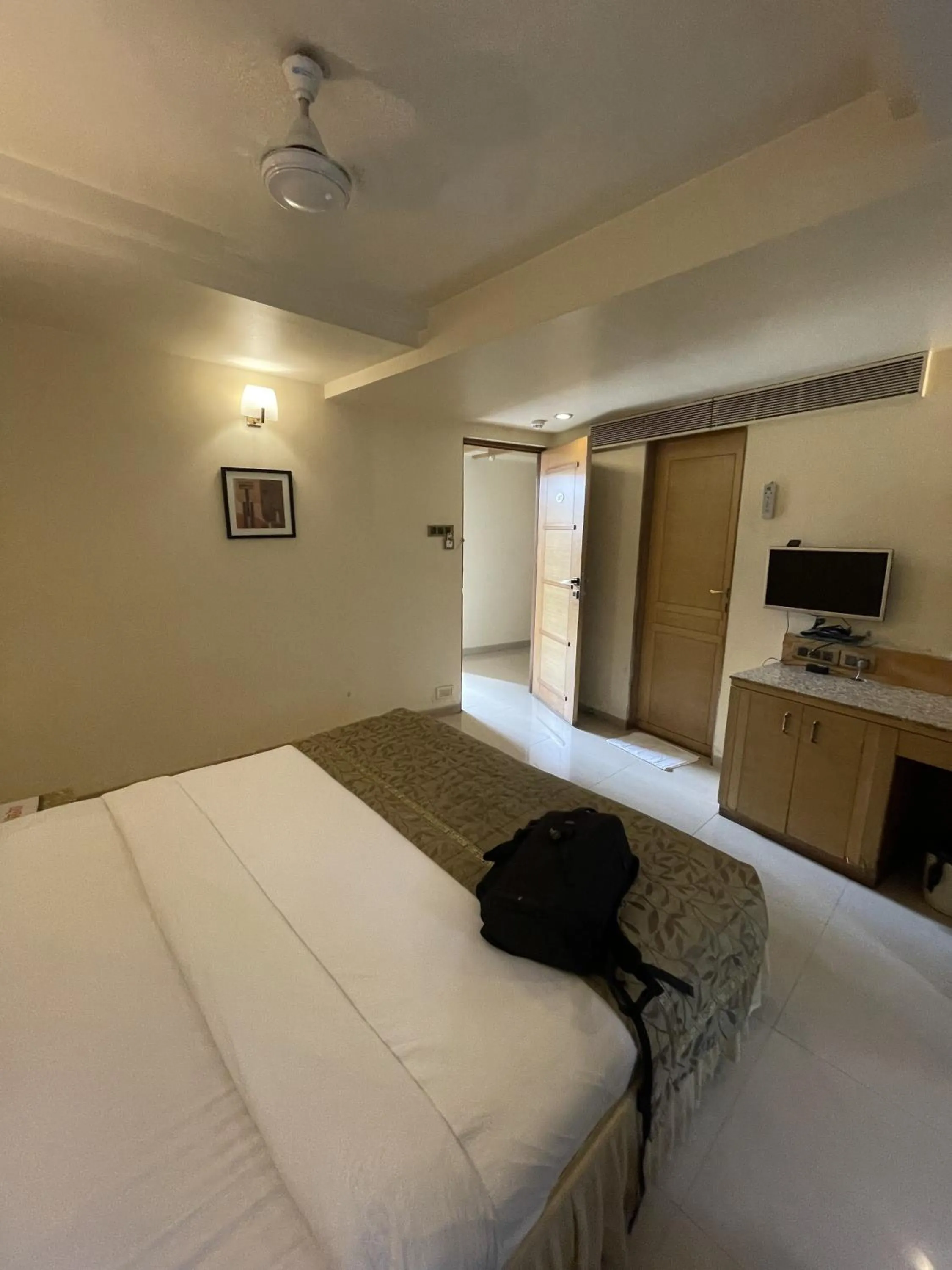 Bedroom in The Deccan Royaale, Shivaji Nagar