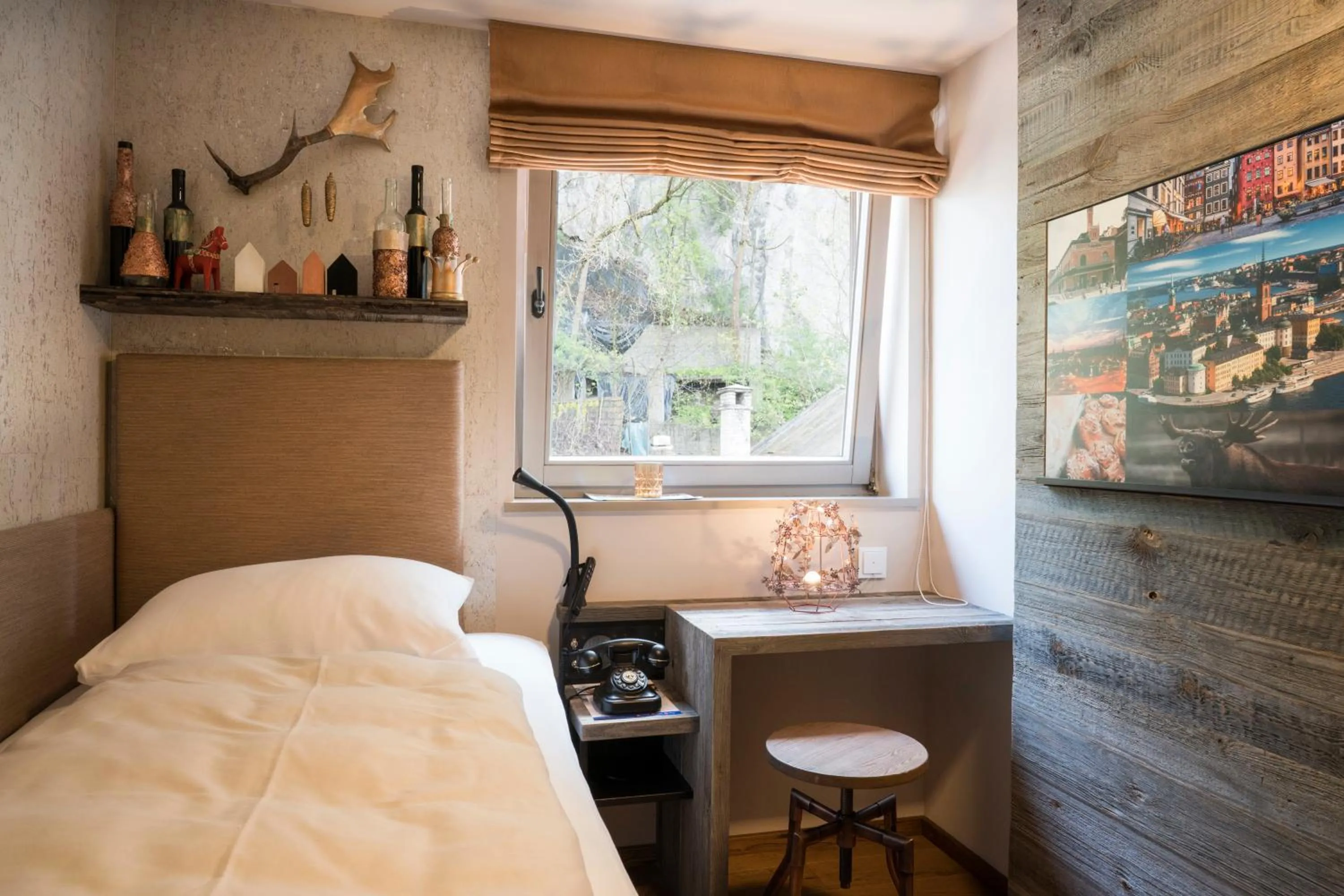 Photo of the whole room, Bed in Boutique Hotel im Auracher Löchl