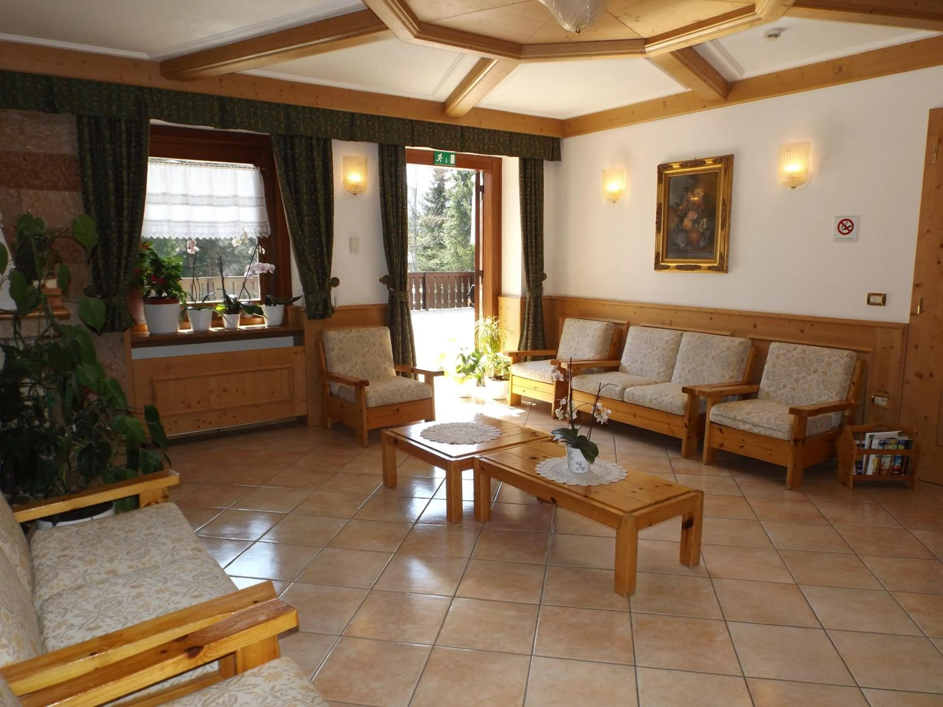 Communal lounge/ TV room in Casa Santa Maria