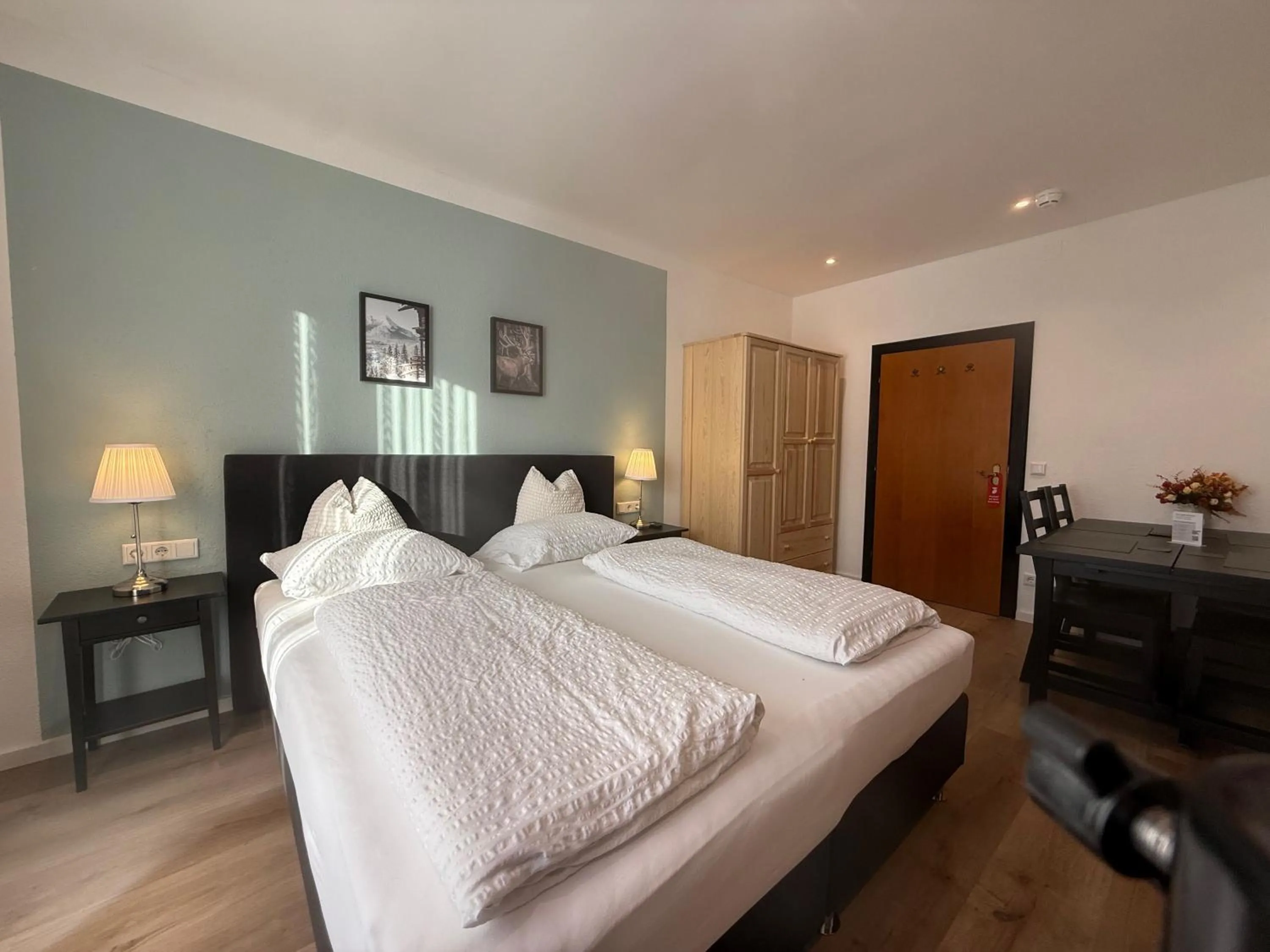 Living room, Bed in Hotel Berghof