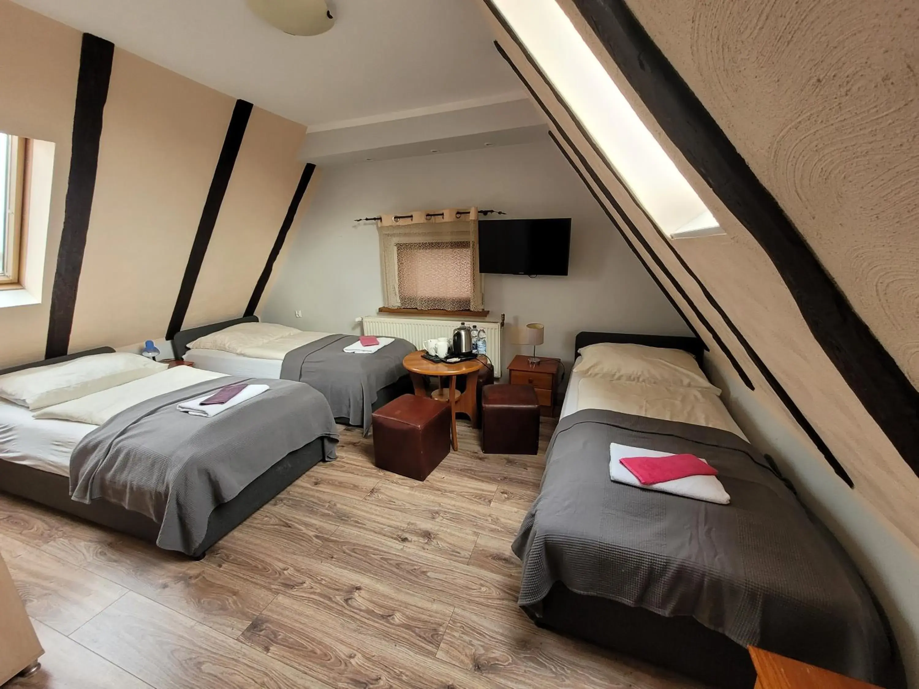 Quadruple Room with Bathroom - single occupancy in Zielony Dom Quadruple Room with Bathroom - single occupancy in Zielony Dom