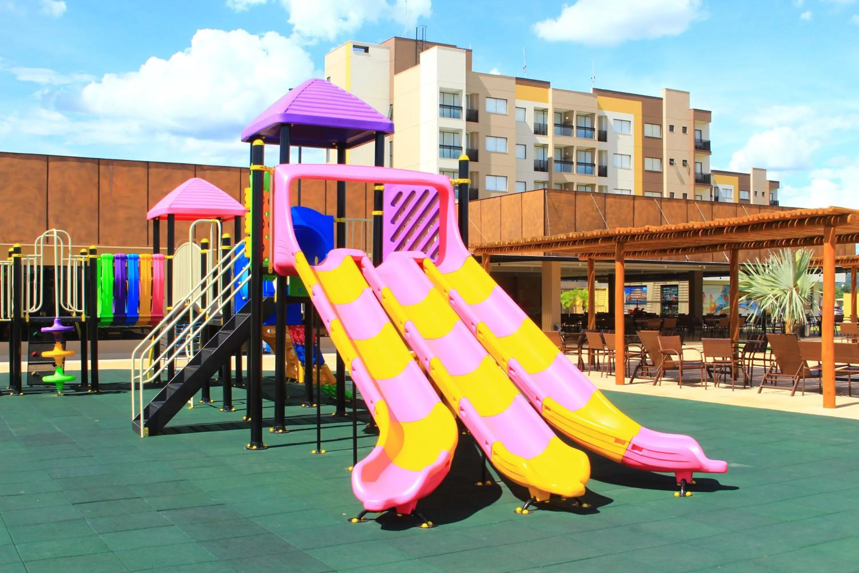 Children play ground in Praias do Lago Eco Resort by WAM Experience