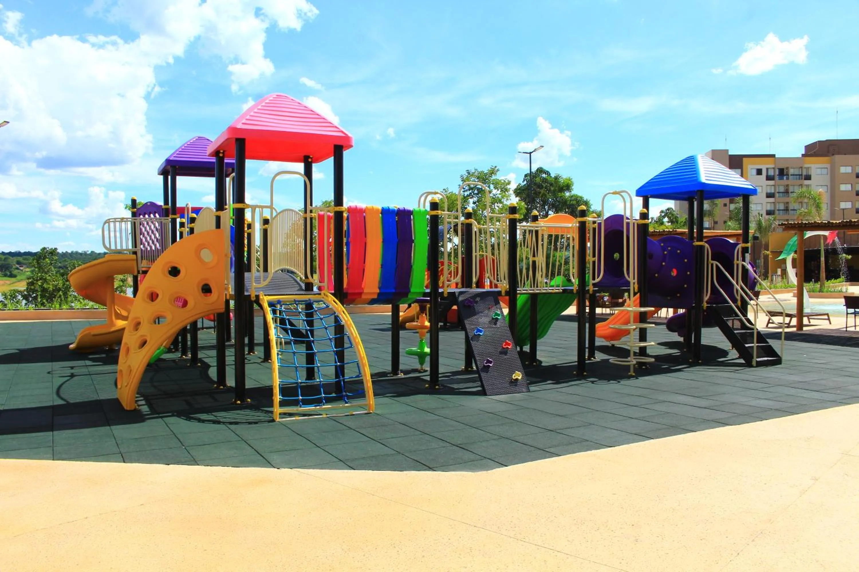 Children play ground in Praias do Lago Eco Resort by WAM Experience