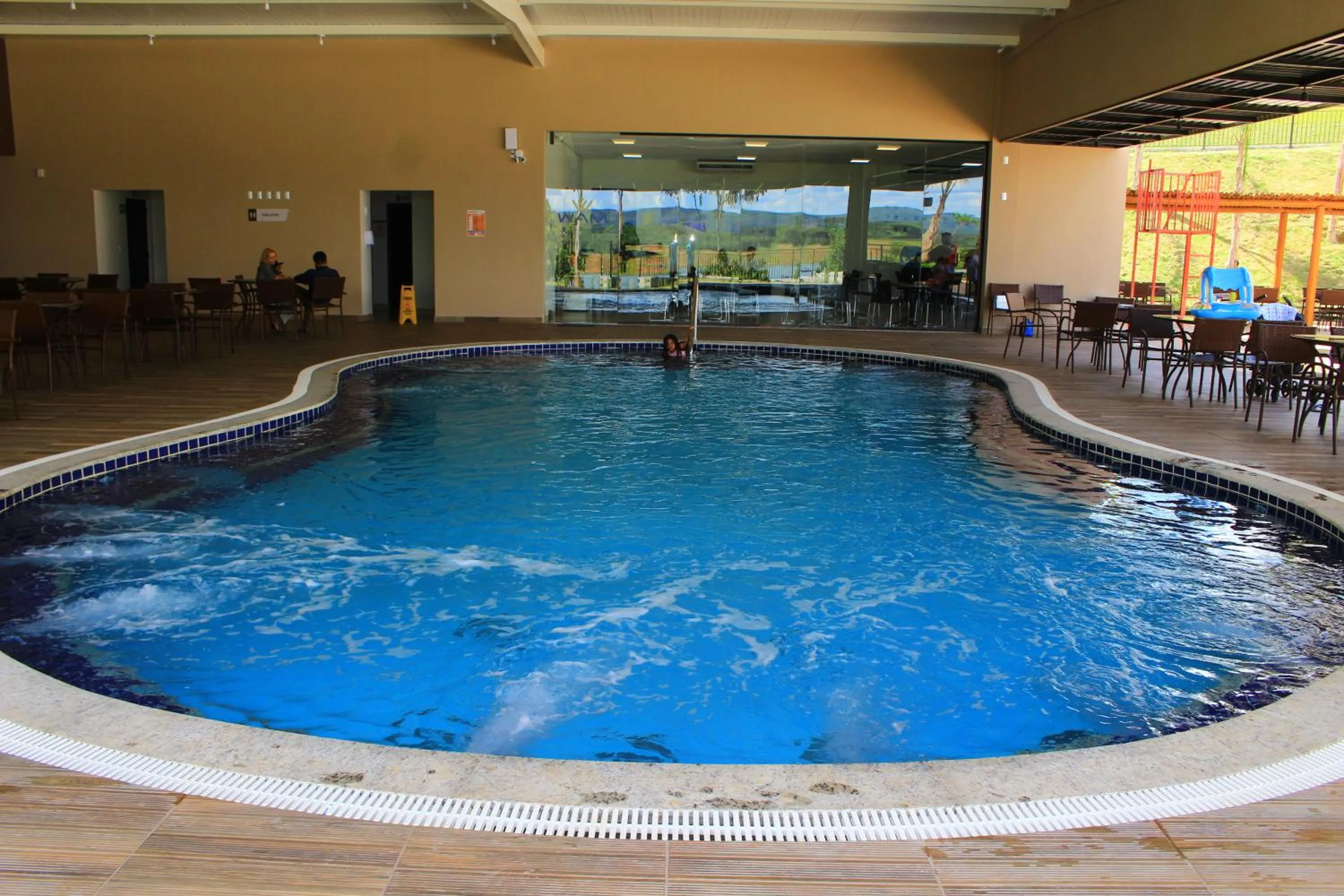 Swimming pool in Praias do Lago Eco Resort by WAM Experience